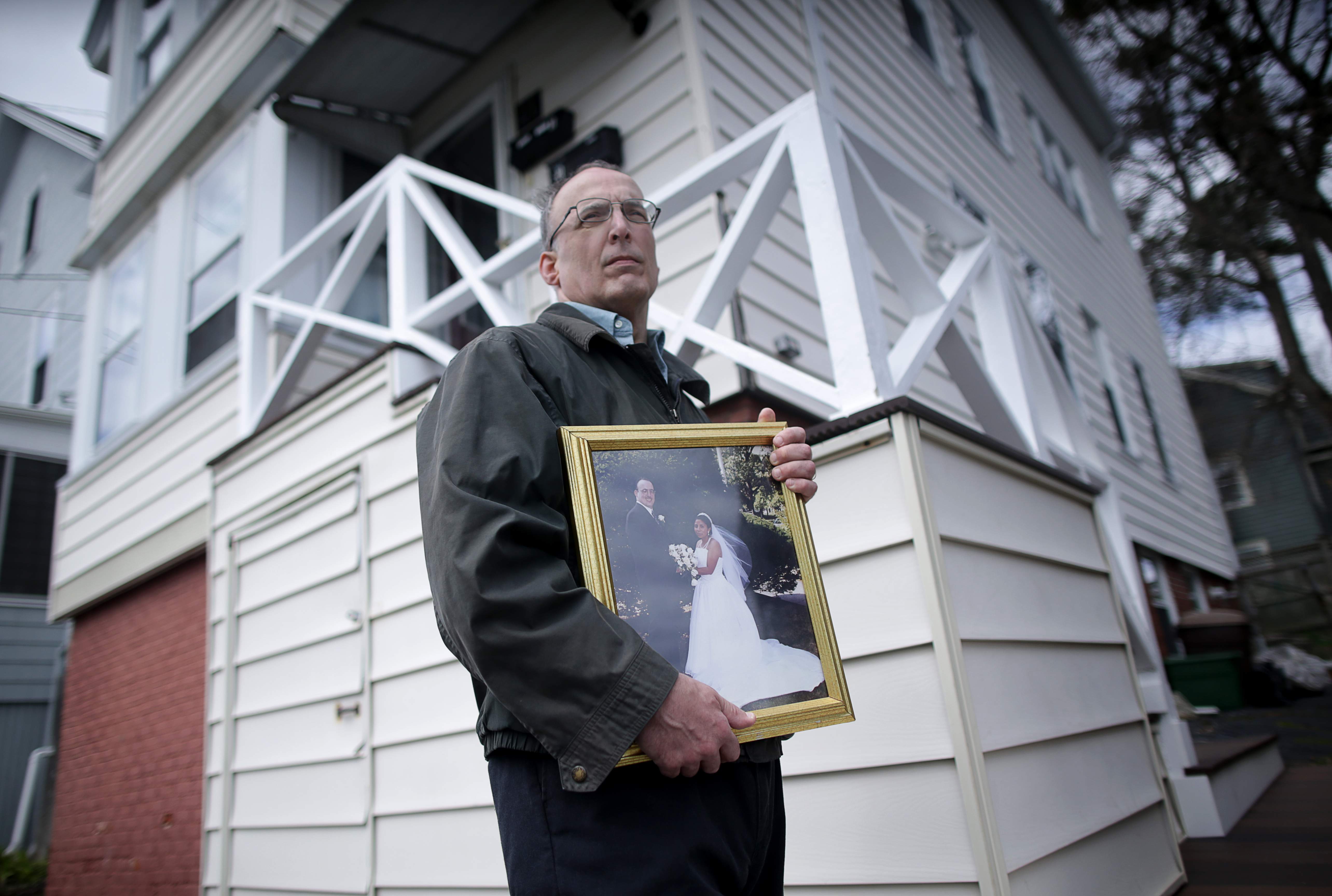 David Williams held his wedding photograph Friday.