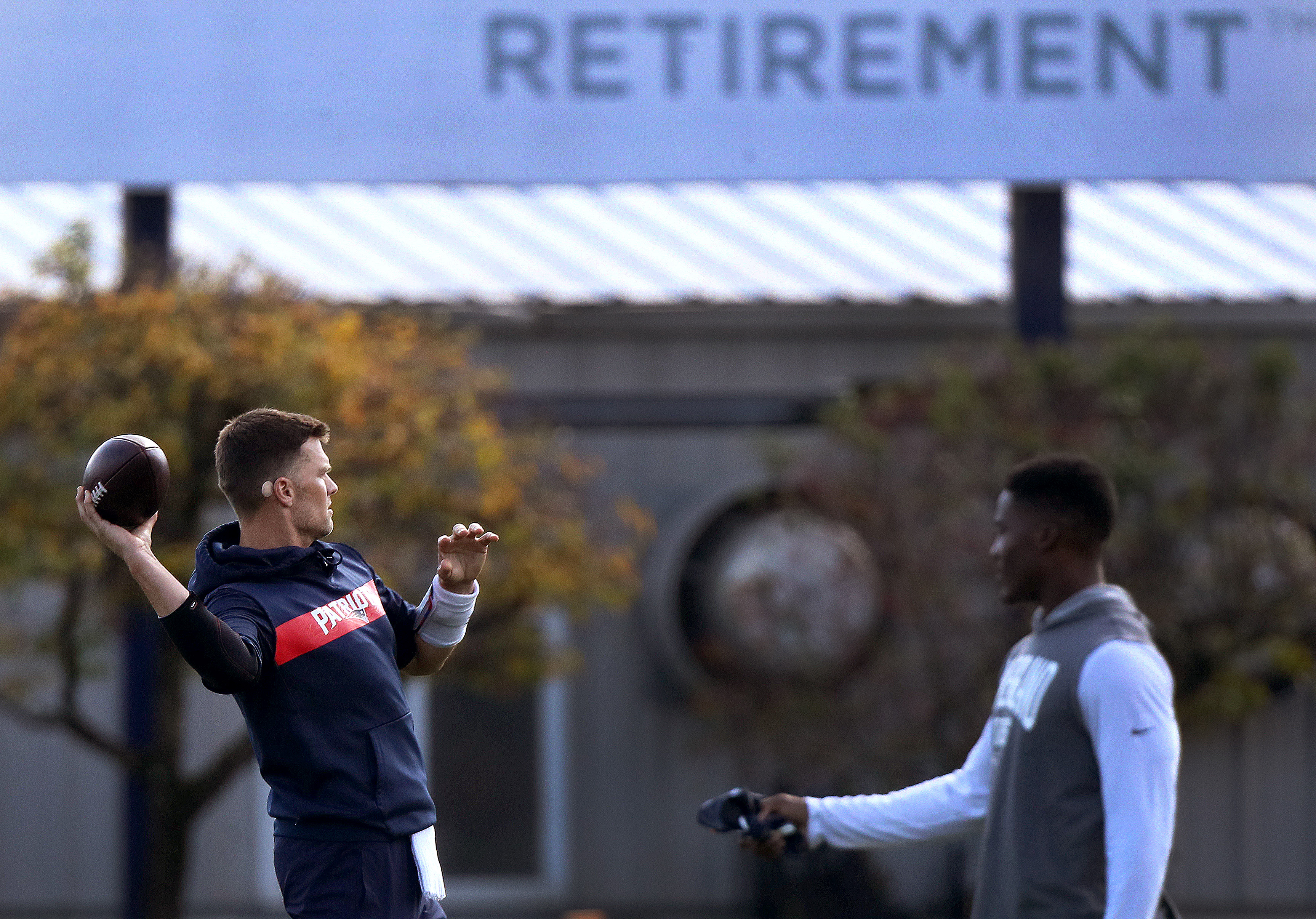 Tom Brady throws during Wednesday’s walkthrough.