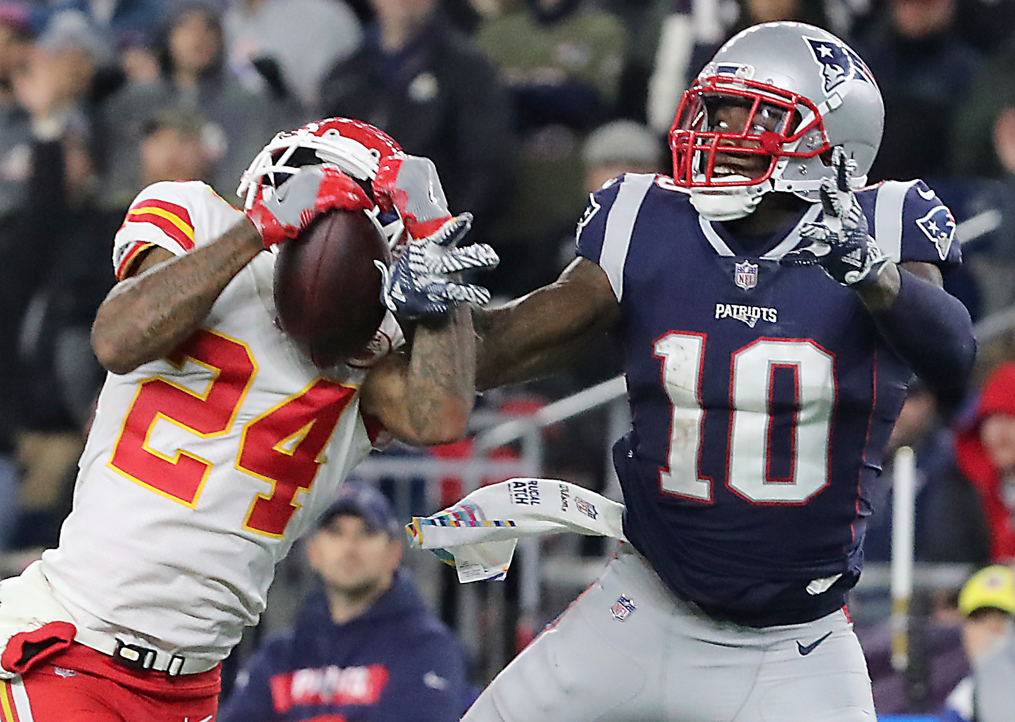 Jordan Lucas almost intercepts the ball, but Josh Gordon (10) broke it up as the pair fell to the turf.