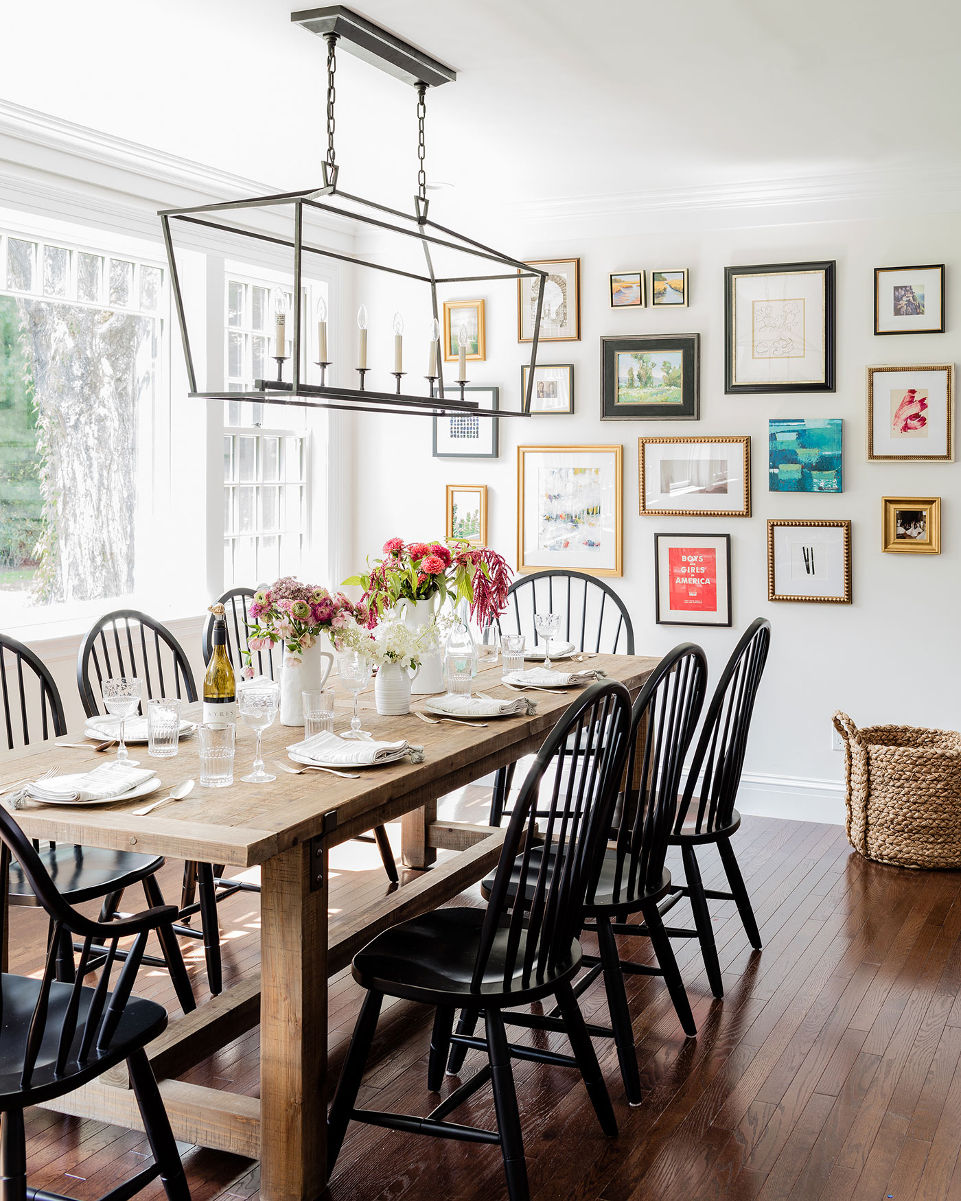 Gates added the Darlana lantern by Visual Comfort and created a gallery wall in the eating area adjacent to the family room.