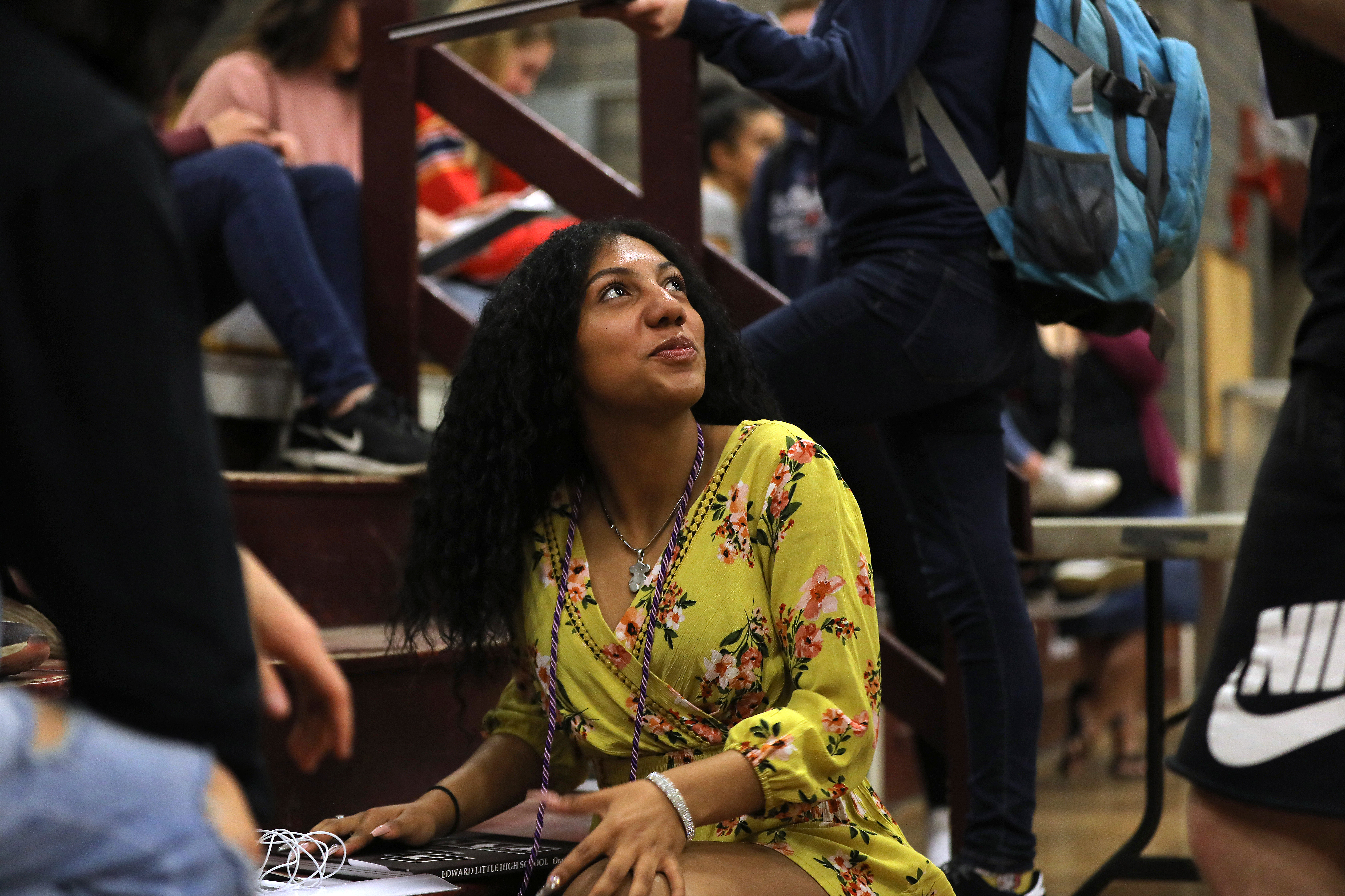 Naiv Luciano Velez attended a senior assembly in the high school gym to pick up her yearbook