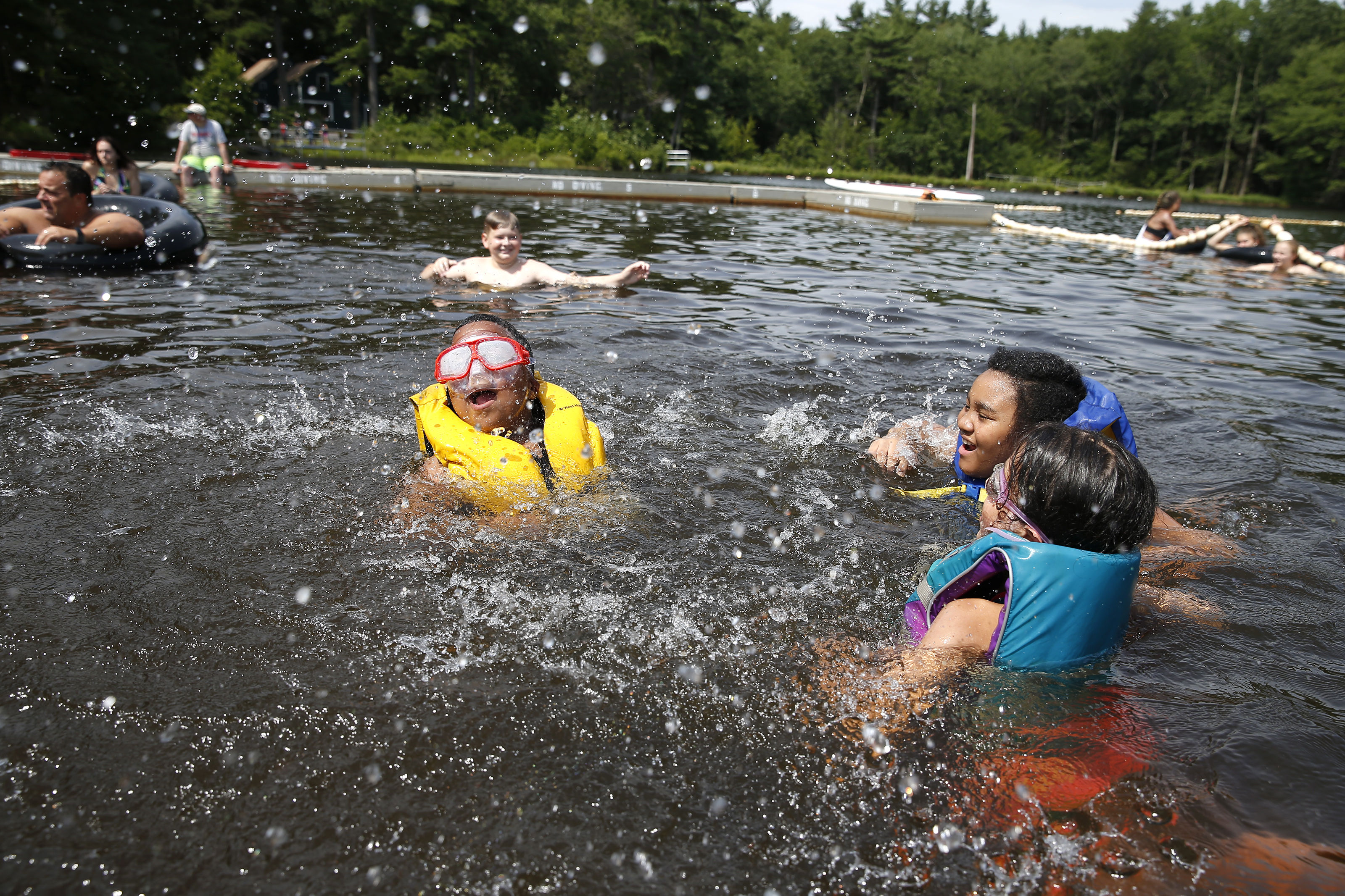 From left: Angel Sierra, Scarlett Fuentes, and Nevaeh Abustan took a dip in the pond.