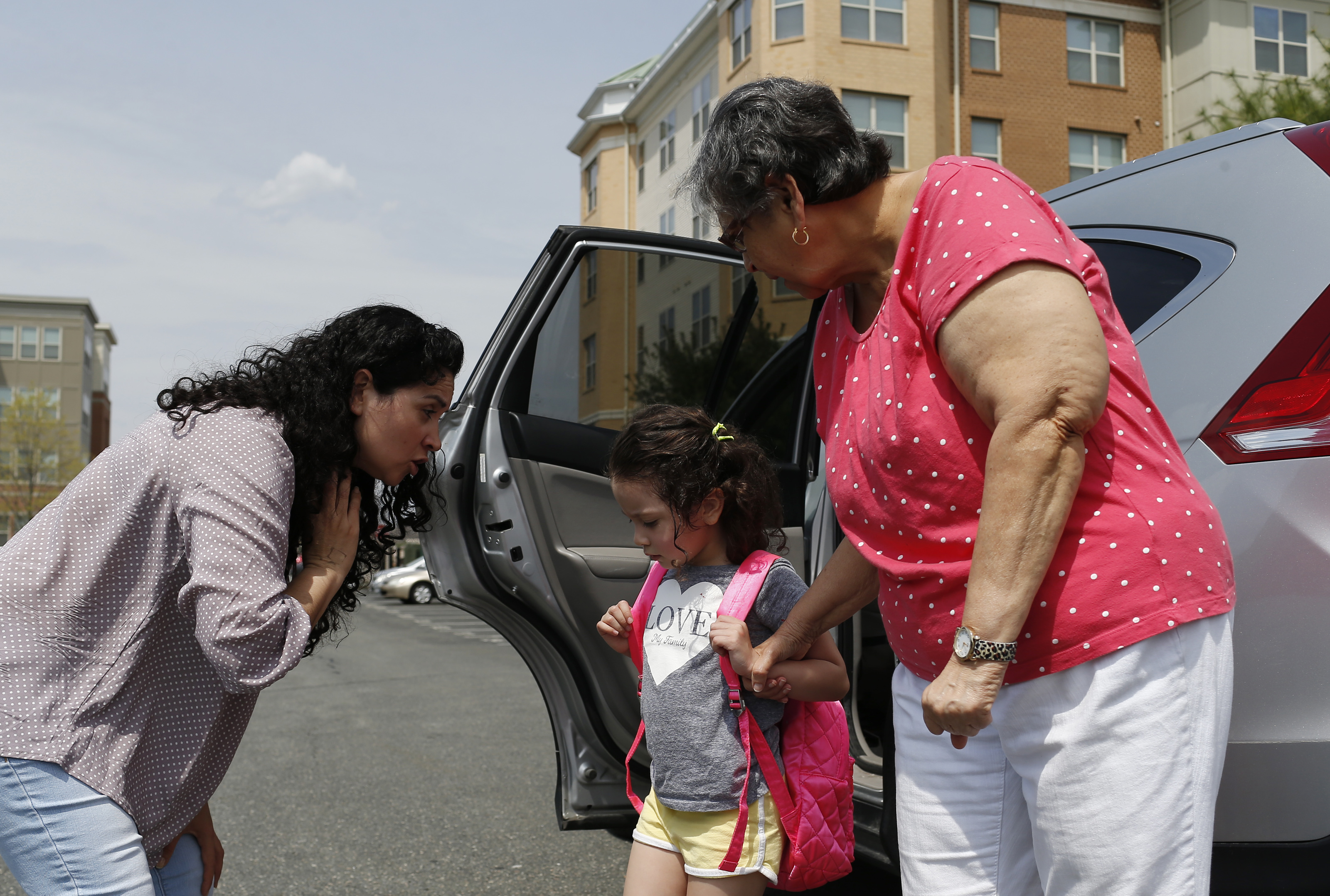 Patricia bent down to say goodbye to her daughter, Camila, as she dropped her off with her godmother’s mother, Tete, before a meeting with her lawyer. Tete has agreed to be the emergency caregiver for Camila in the event that Patricia is unexpectedly deported. If the worst were to happen, Tete would take Camila until they could find a way to reunite her with her mother in Honduras.