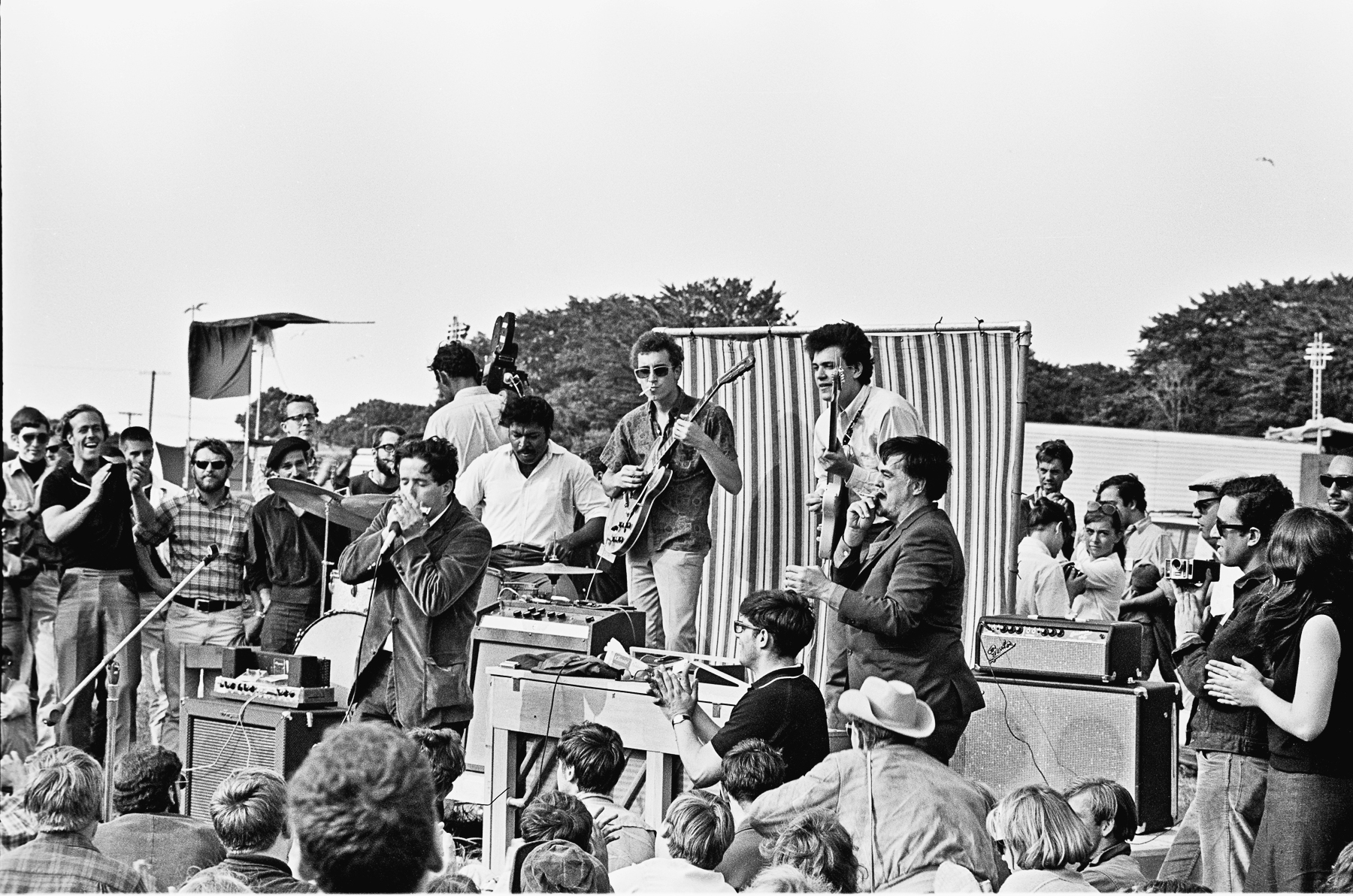 The Butterfield Blues Band, with Alan Lomax on the right, in an undated photo.