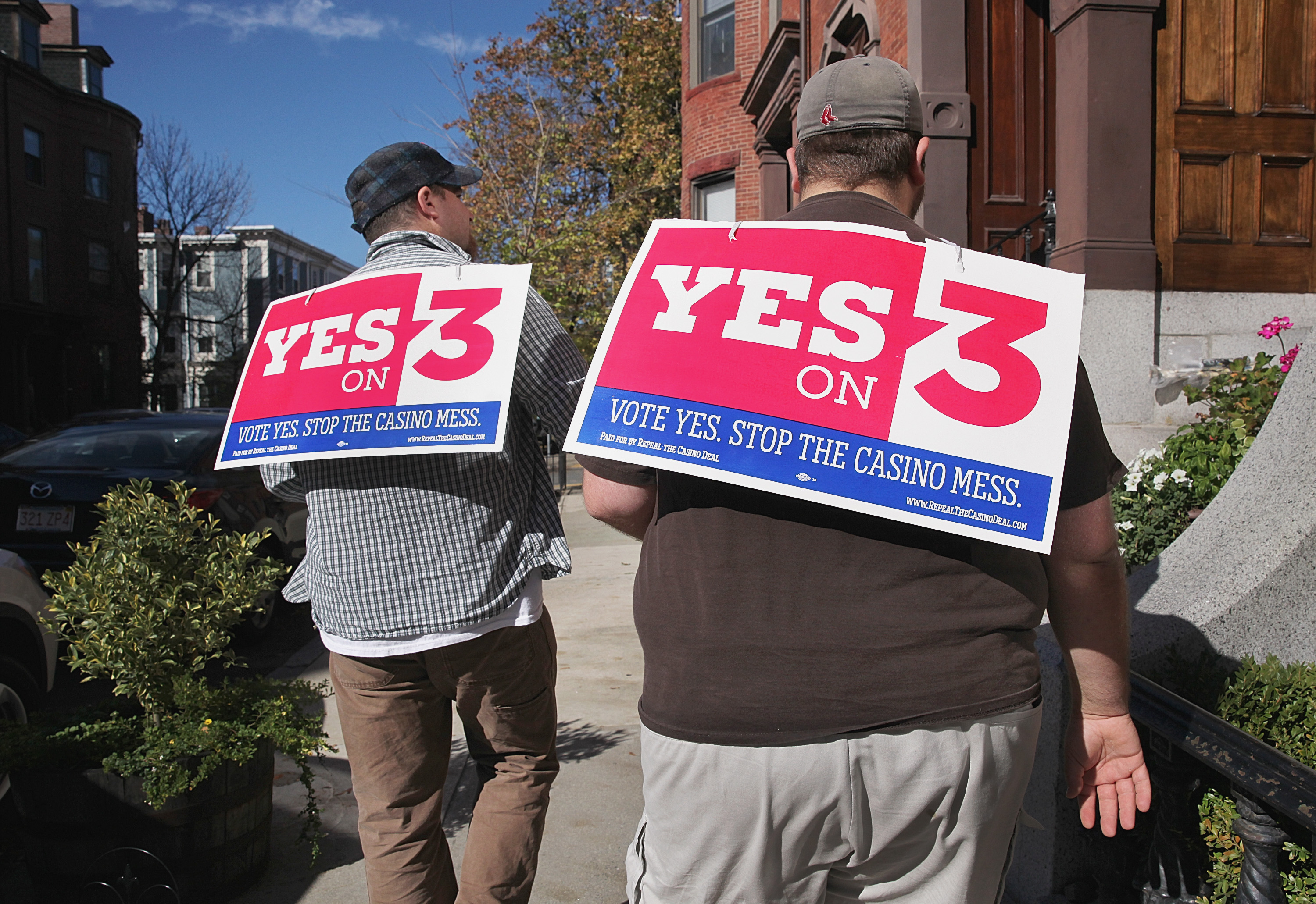 John Rogers (left) and Joseph Catricala took to High Street in Charlestown to talk to residents about supporting Question 3.