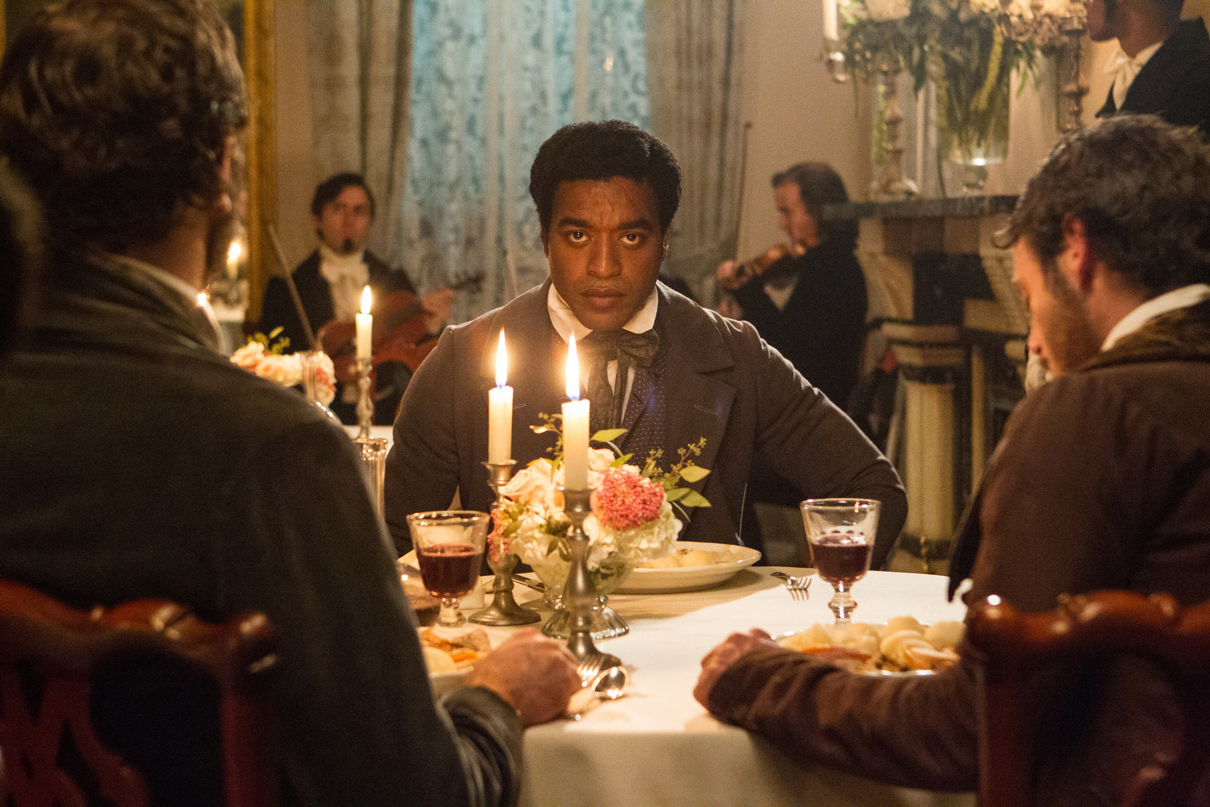 This image released by Fox Searchlight shows Chiwetel Ejiofor in a scene from "12 Years A Slave." (TWELVE YEARS A SLAVE) (AP Photo/Fox Searchlight, Jaap Buitendijk)