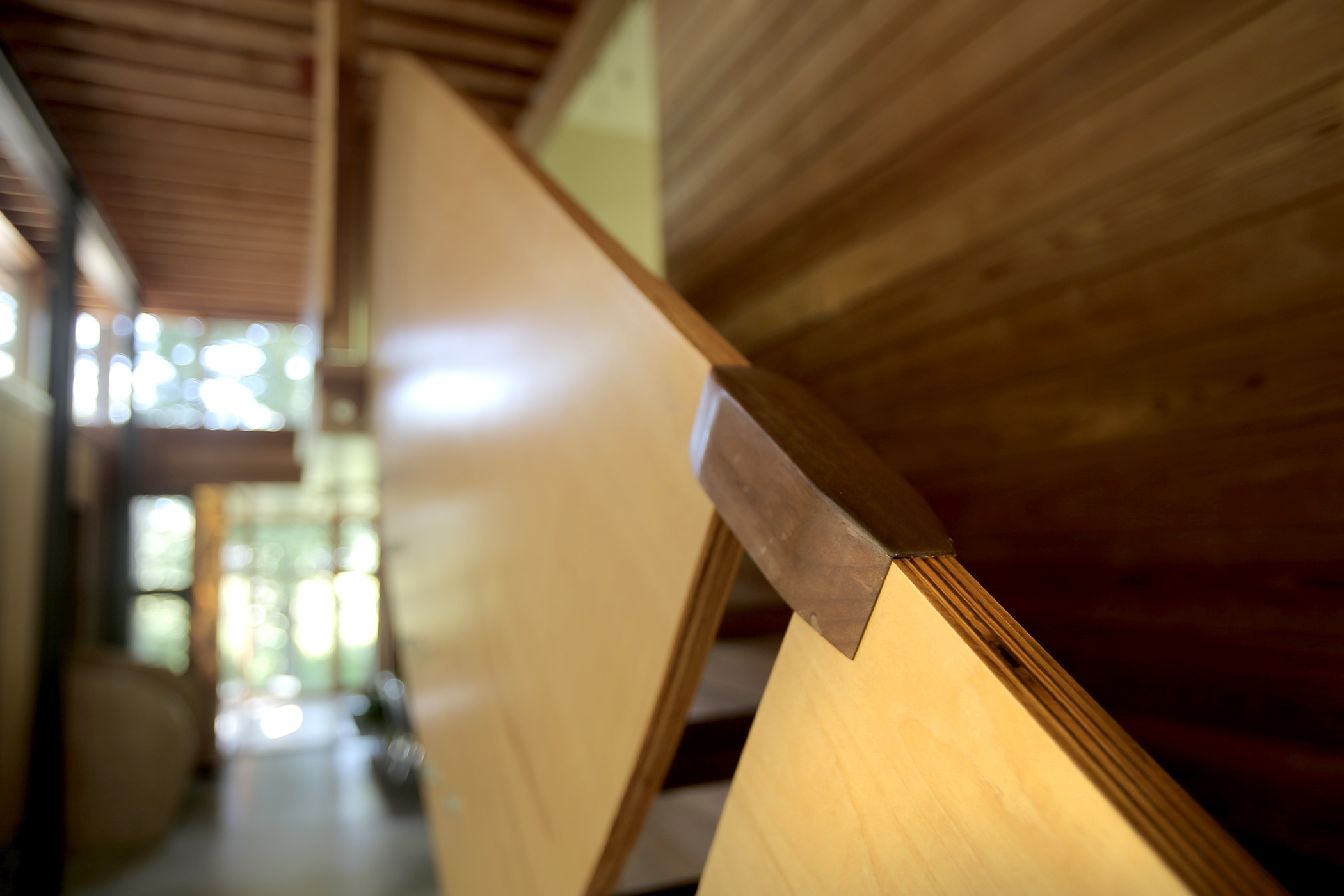 A plywood stair railing