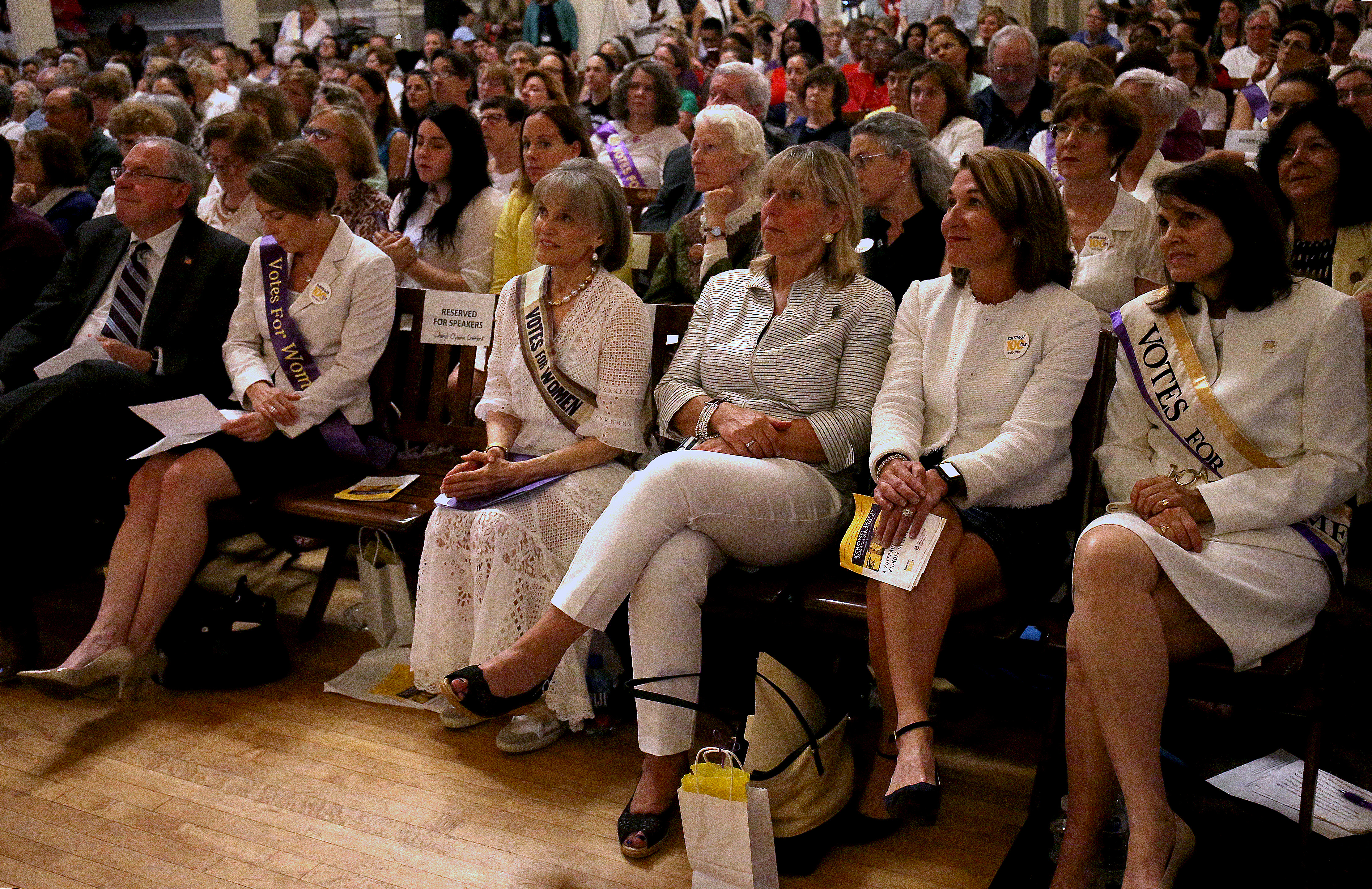 Attendees listened during the event.