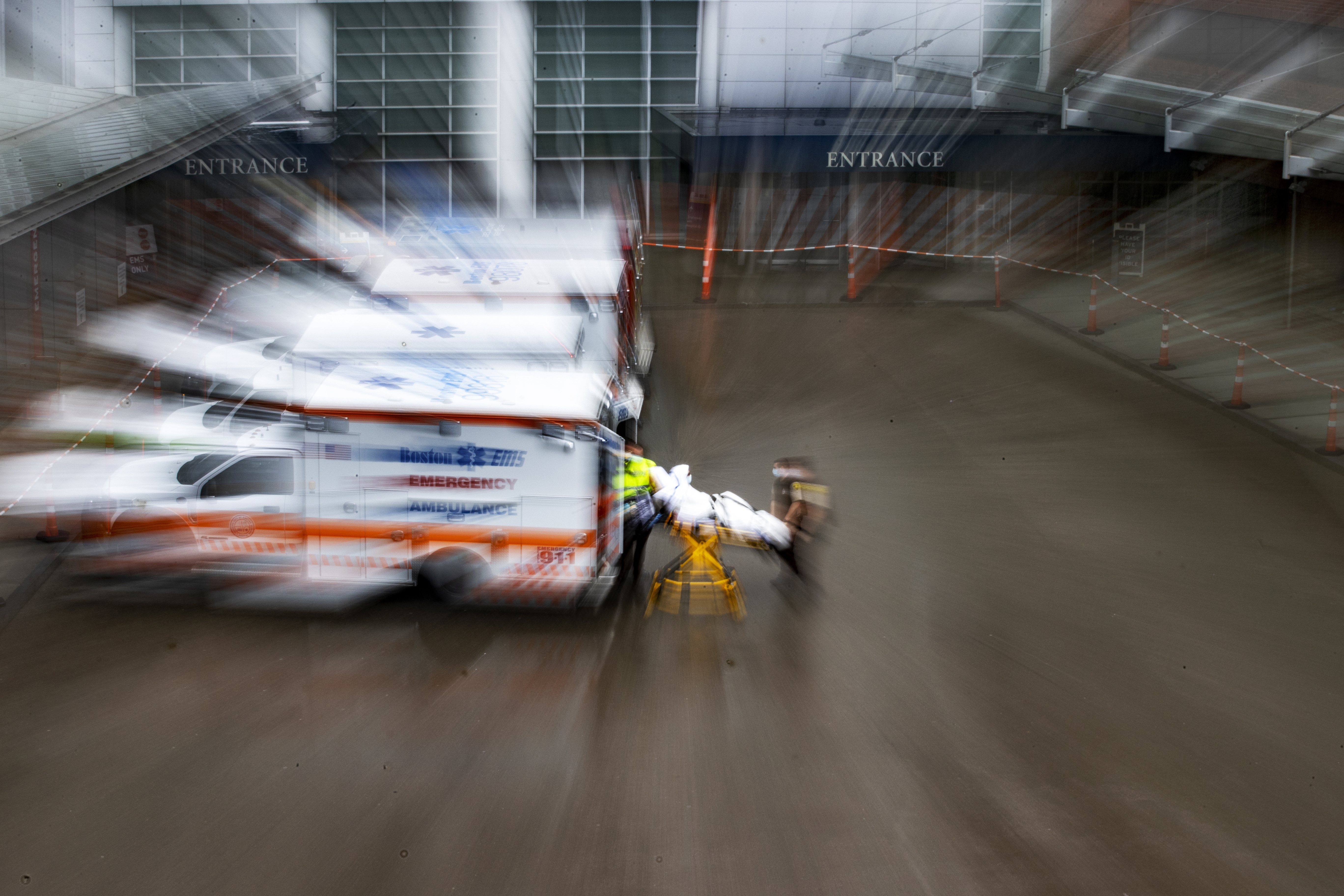 EMTs hurry a patient into the emergency room at Massachusetts General Hospital.