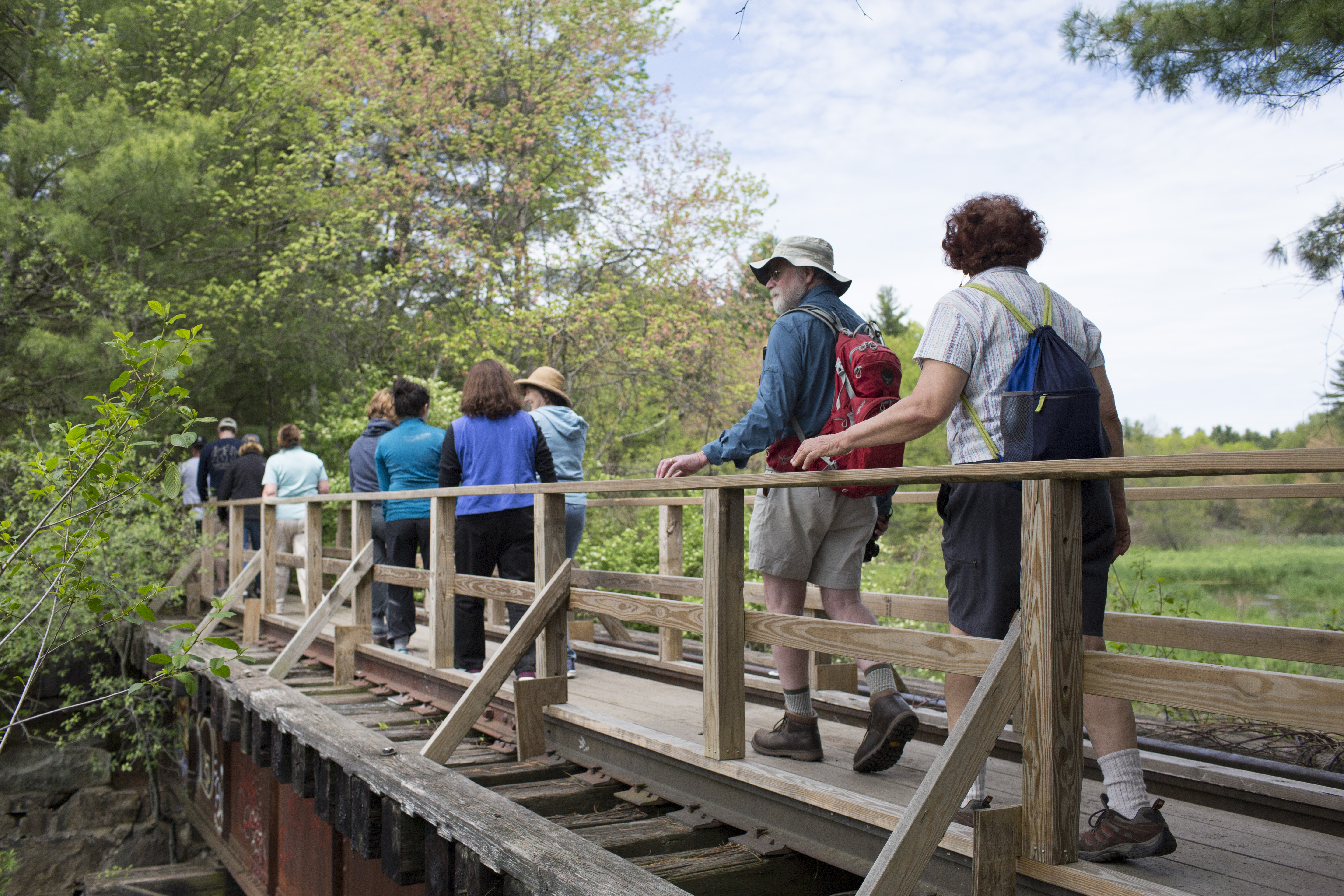 Opponents walked along an inactive MBTA rail bed in Sudbury where Eversource proposes building a transmission line.