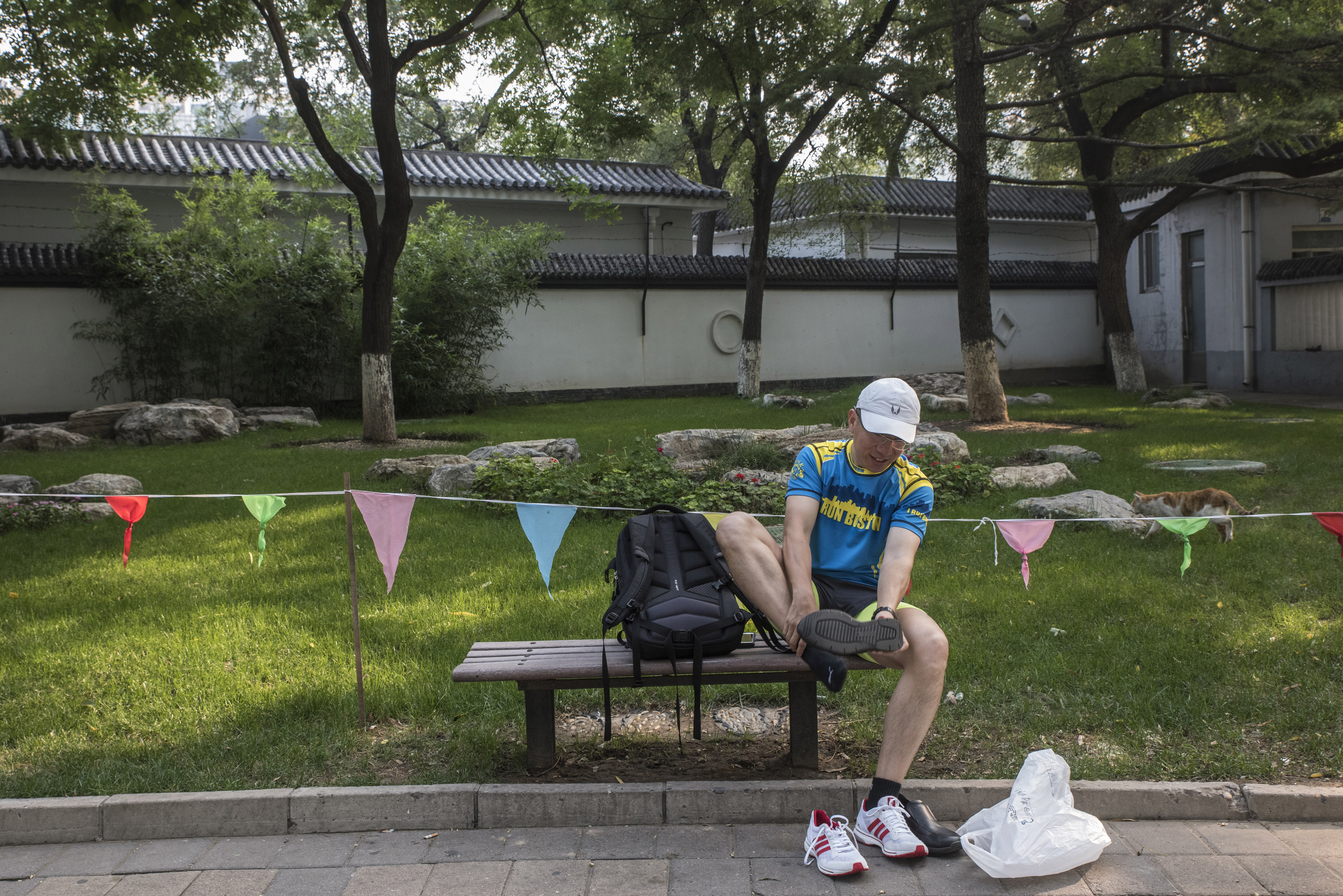 Wang took a break while training for the Beijing marathon.