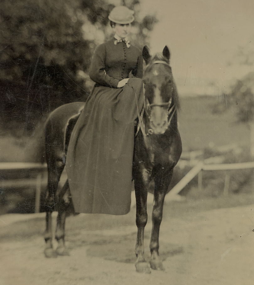 Clover Adams, on horseback.