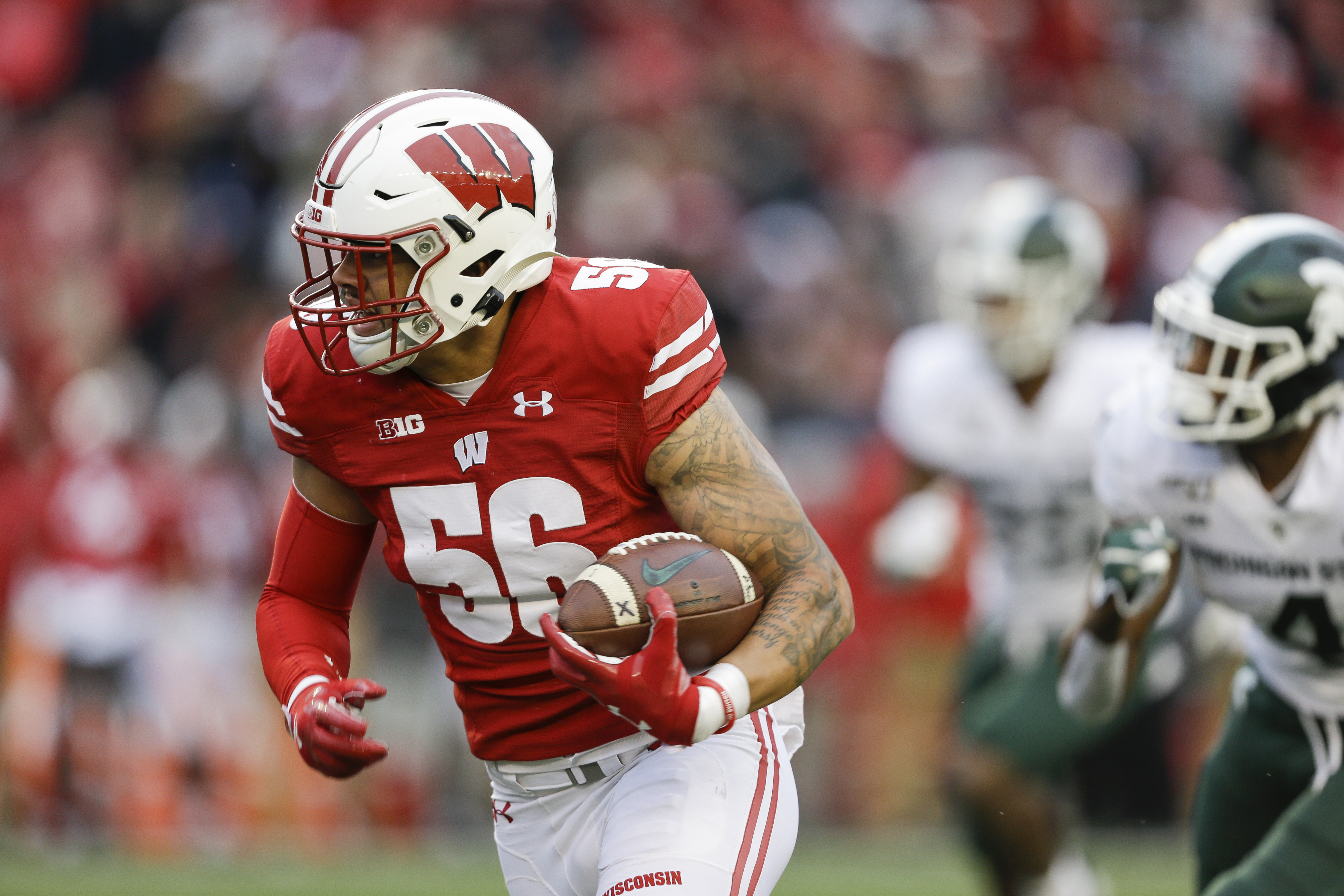 Wisconsin's Zack Baun was among the nation's leaders with 19.5 tackles for loss and 12.5 sacks.