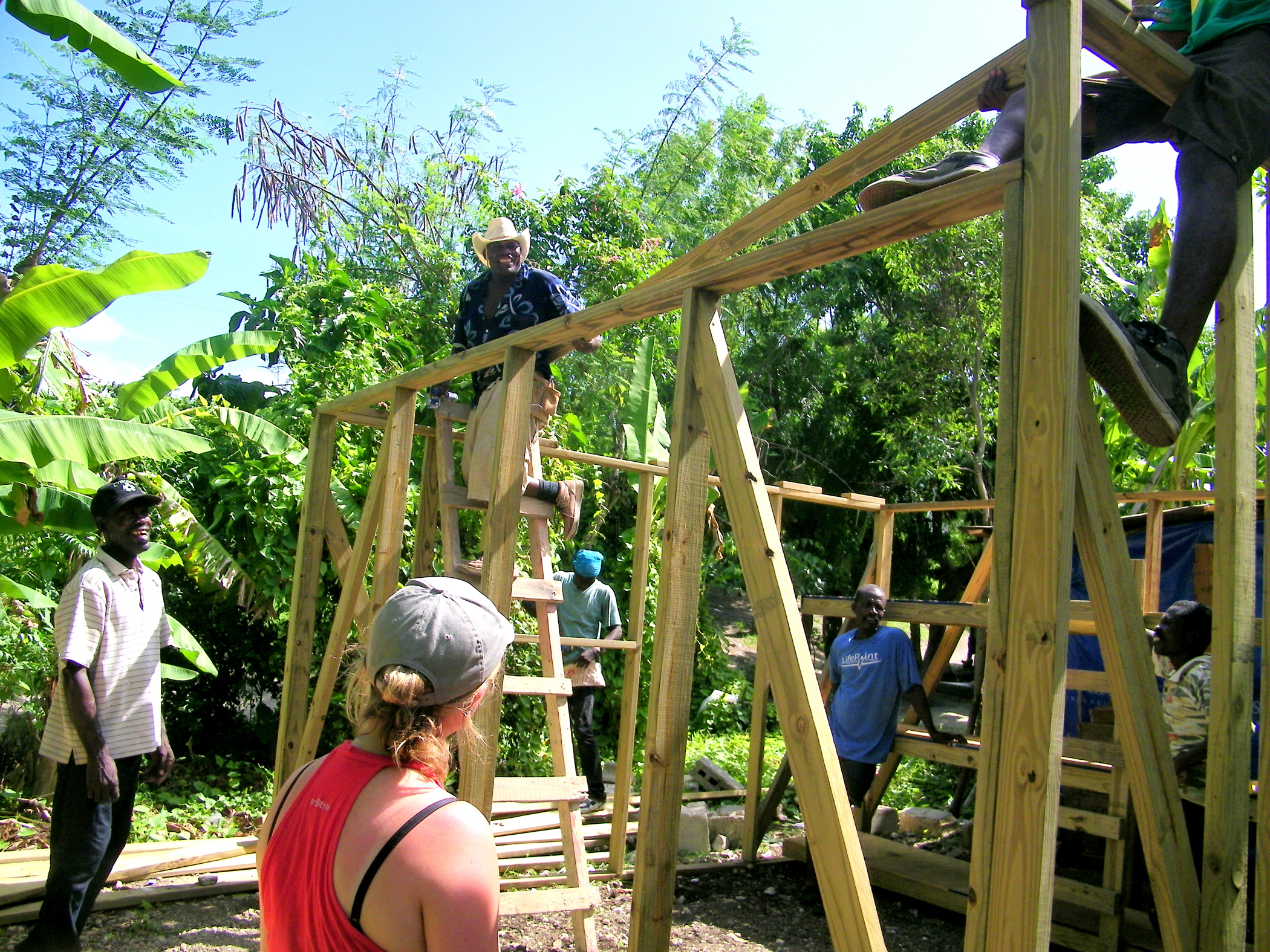 Building the transitional structures for Haitians who had lost their homes.
