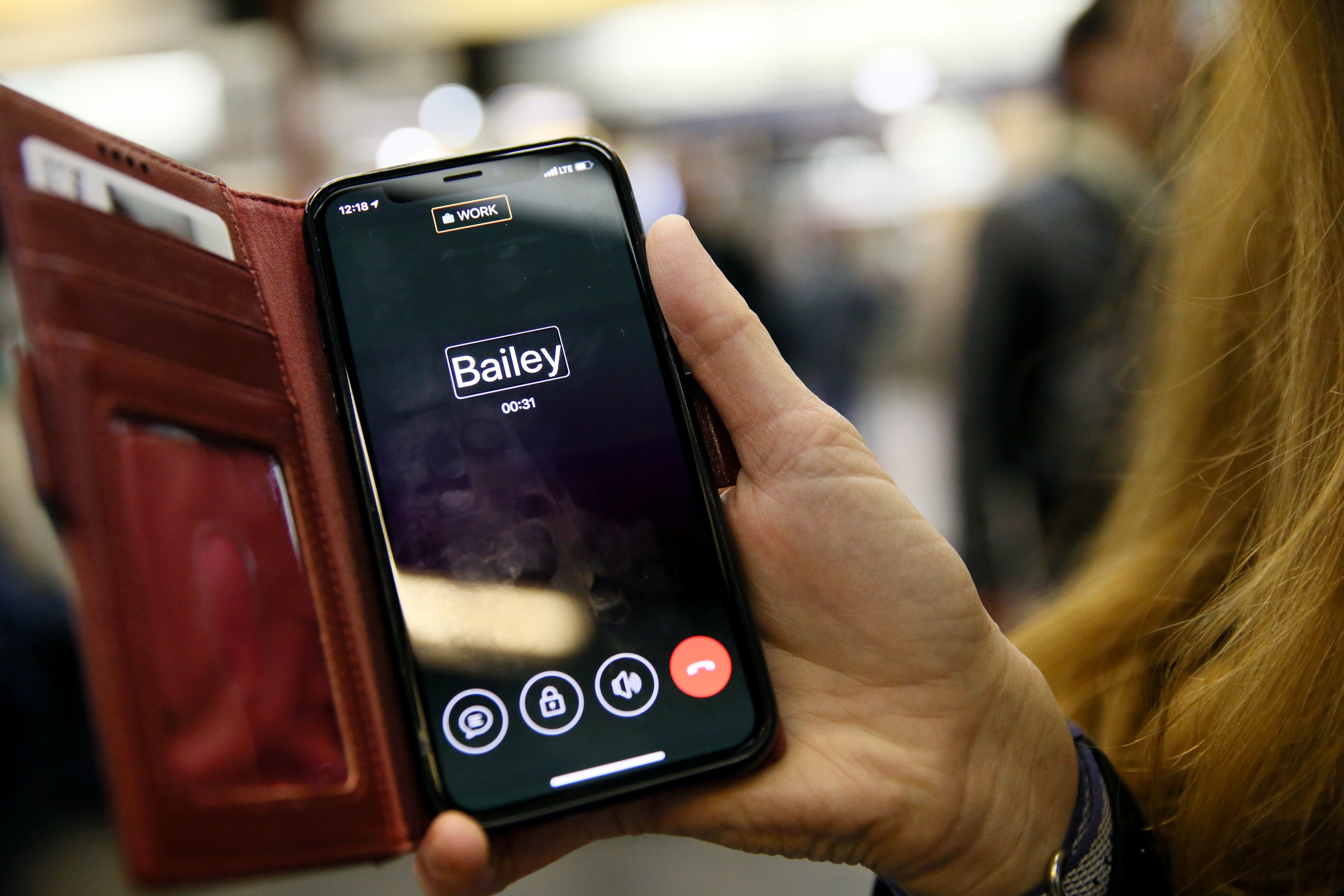 Sassy Outwater-Wright communicated with Aira agent Bailey Putney on her smartphone while demonstrating the Aira app at the Park Street T station in Boston.