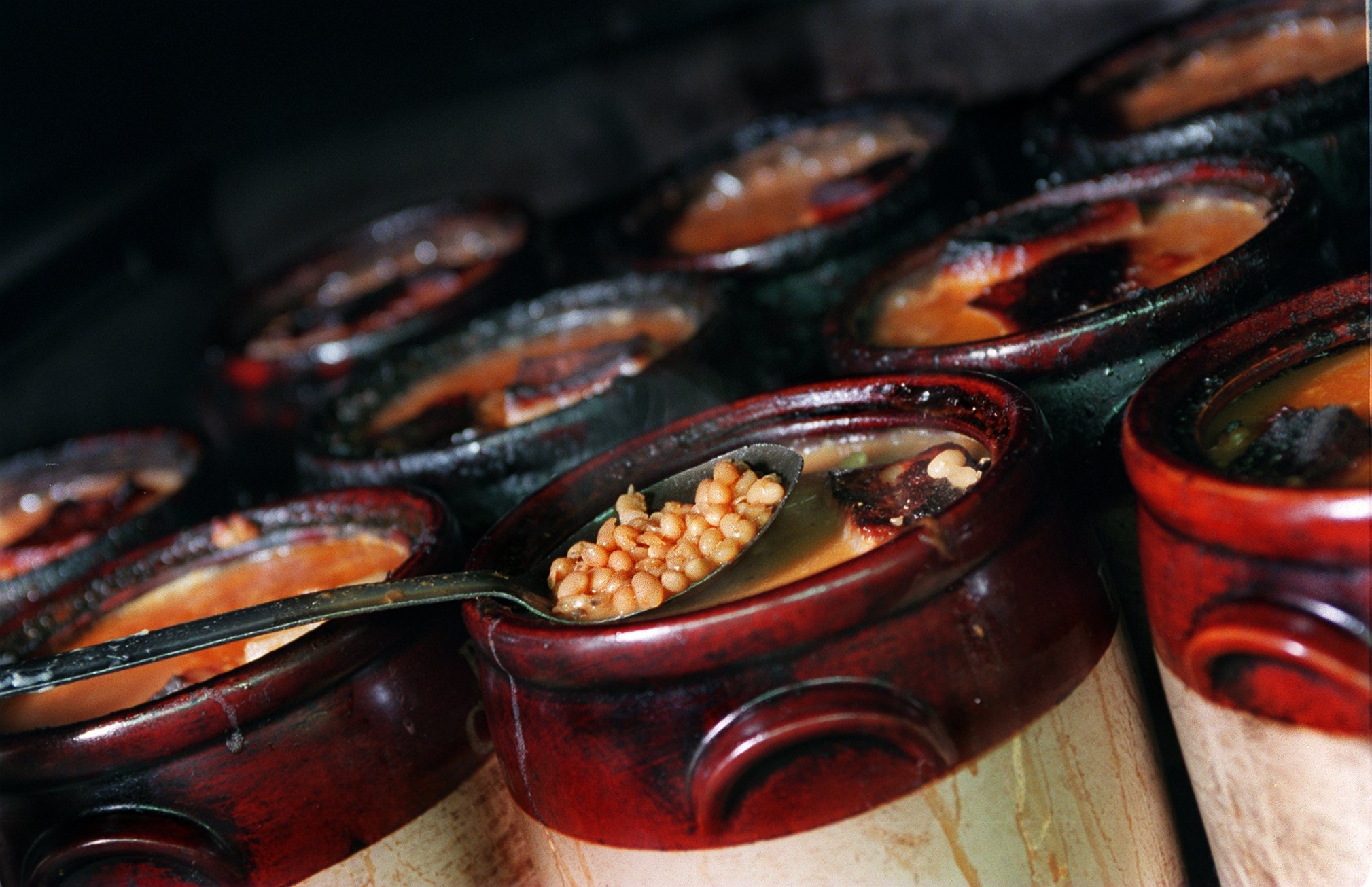 Ceramic pots filled of baked beans, molasses, salt pork and mustard baked for five and half hours at Durgin-Park .