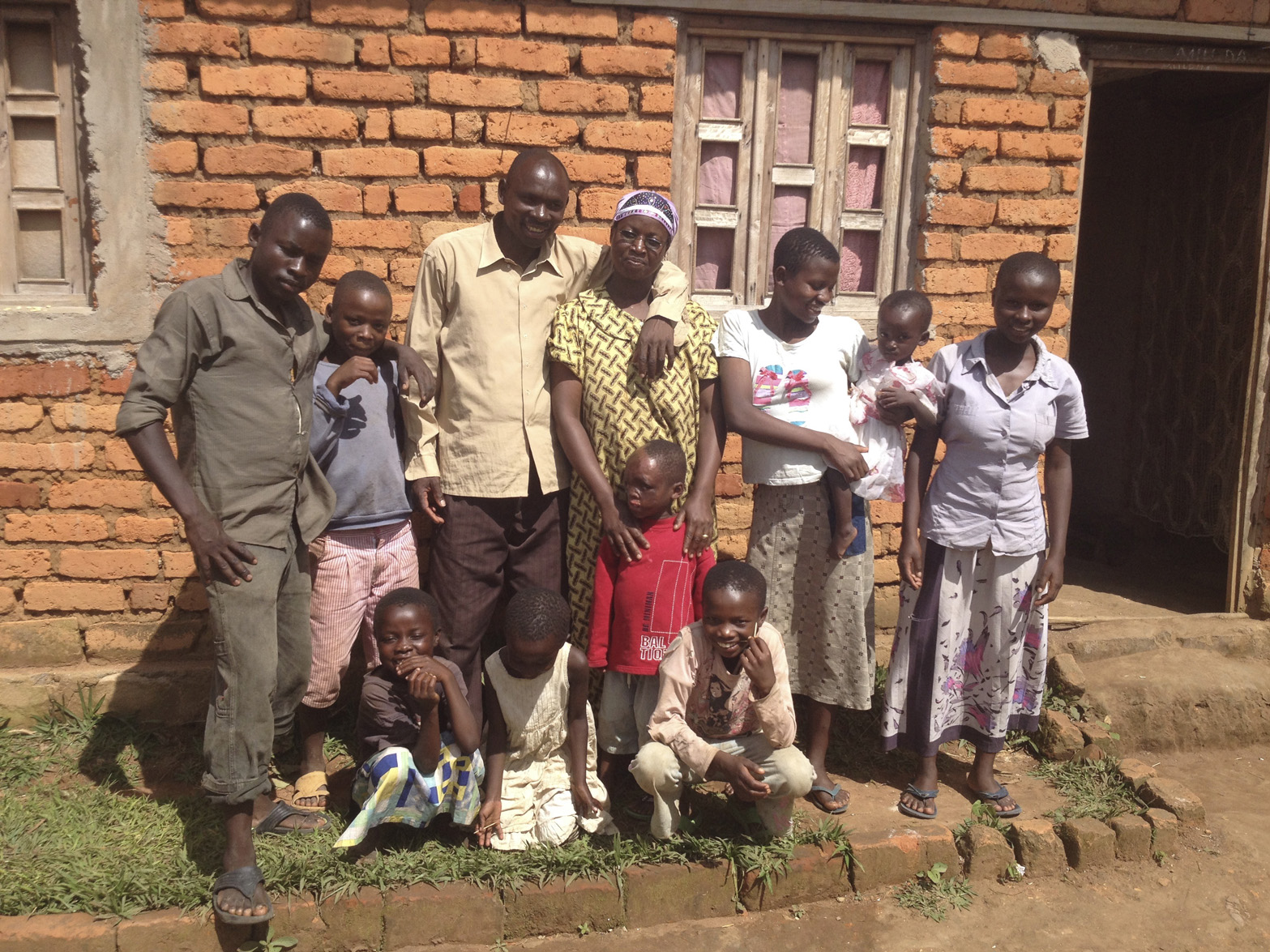 In Burundi, one of the poorest countries on the globe, Leo (in red shirt) lived with his parents and nine siblings.