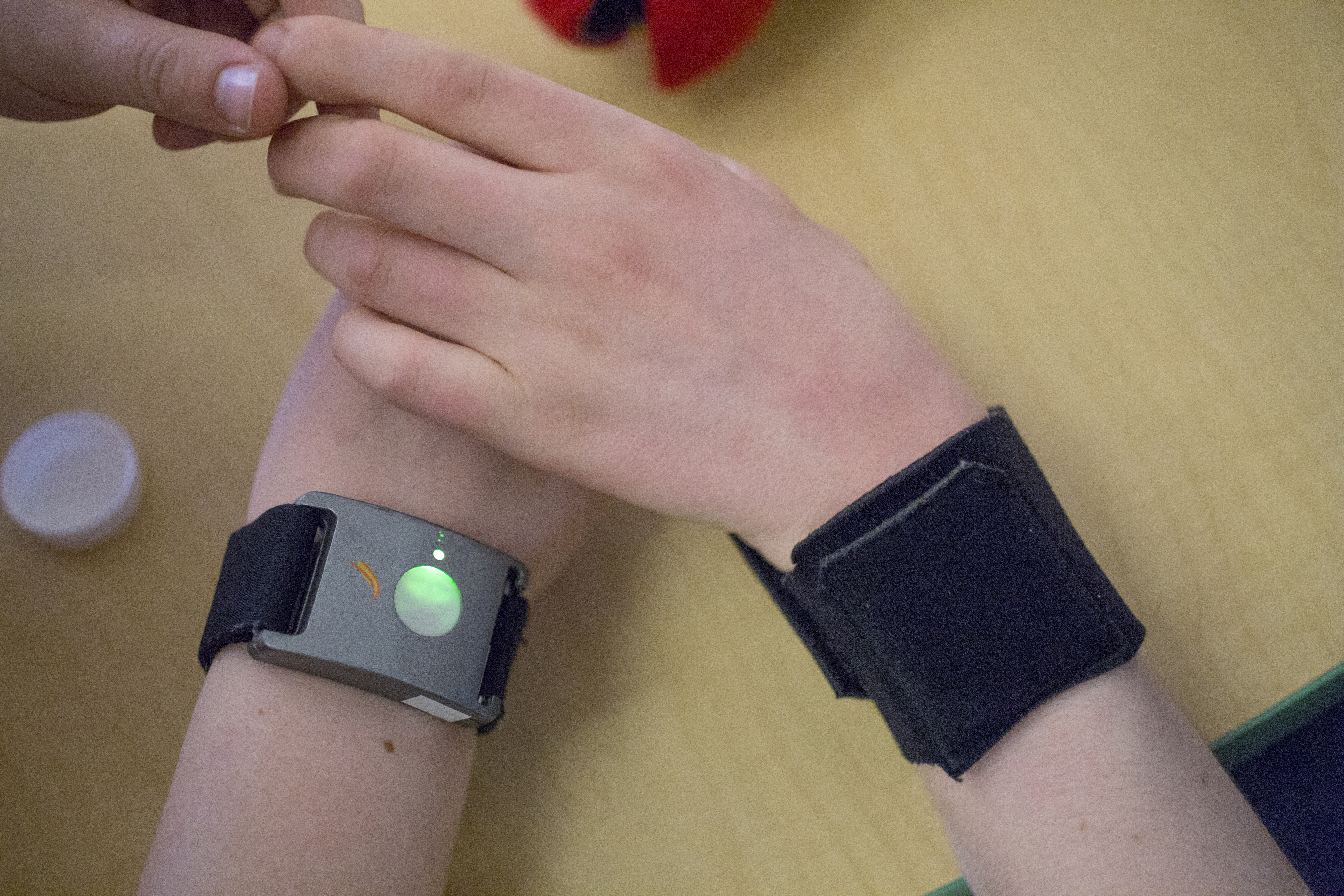 Input from wall-mounted cameras was analyzed together with data transmitted from the wristband devices.