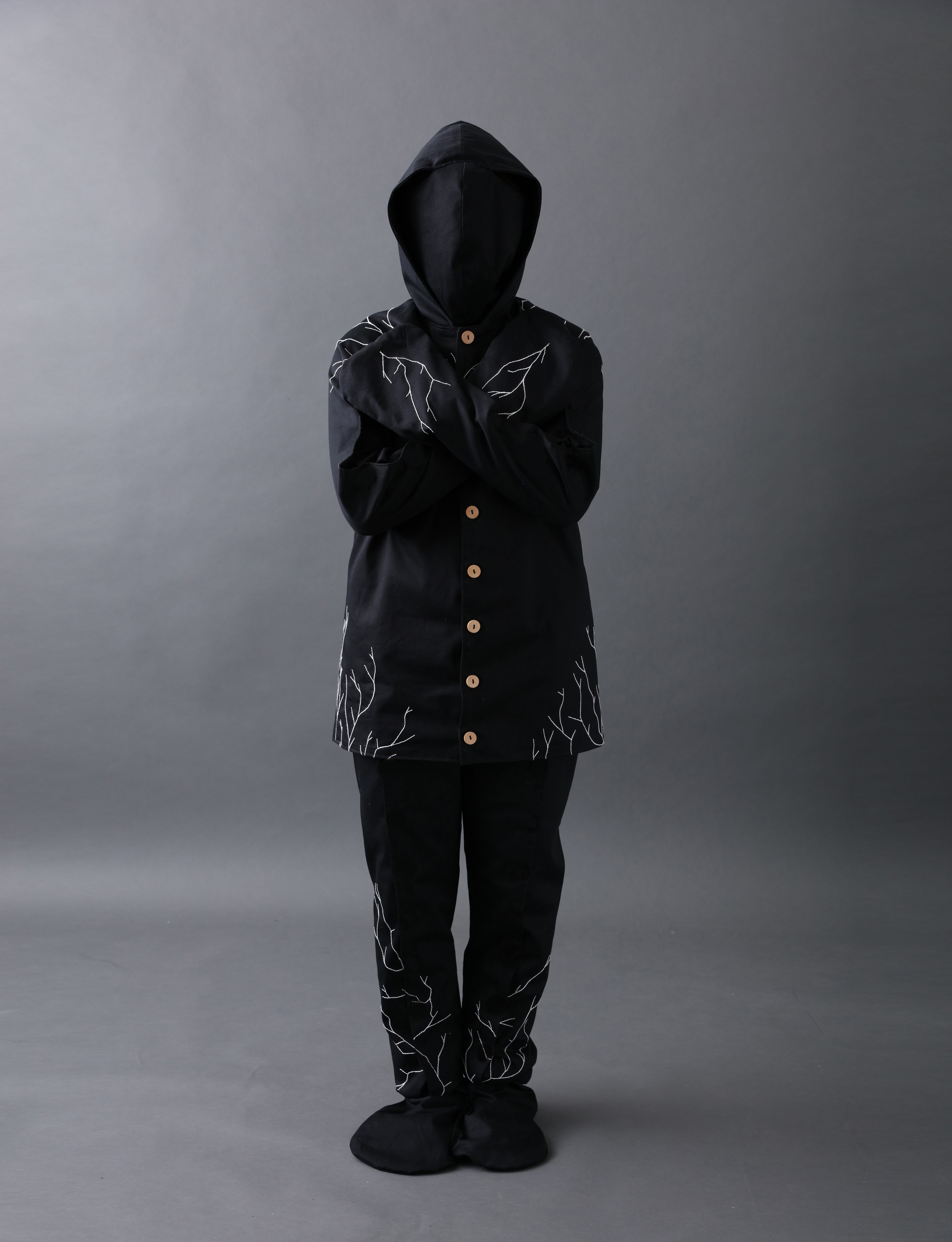 Coeio makes a burial suit embedded with mushrooms to help speed decomposition and rid the body of toxins.