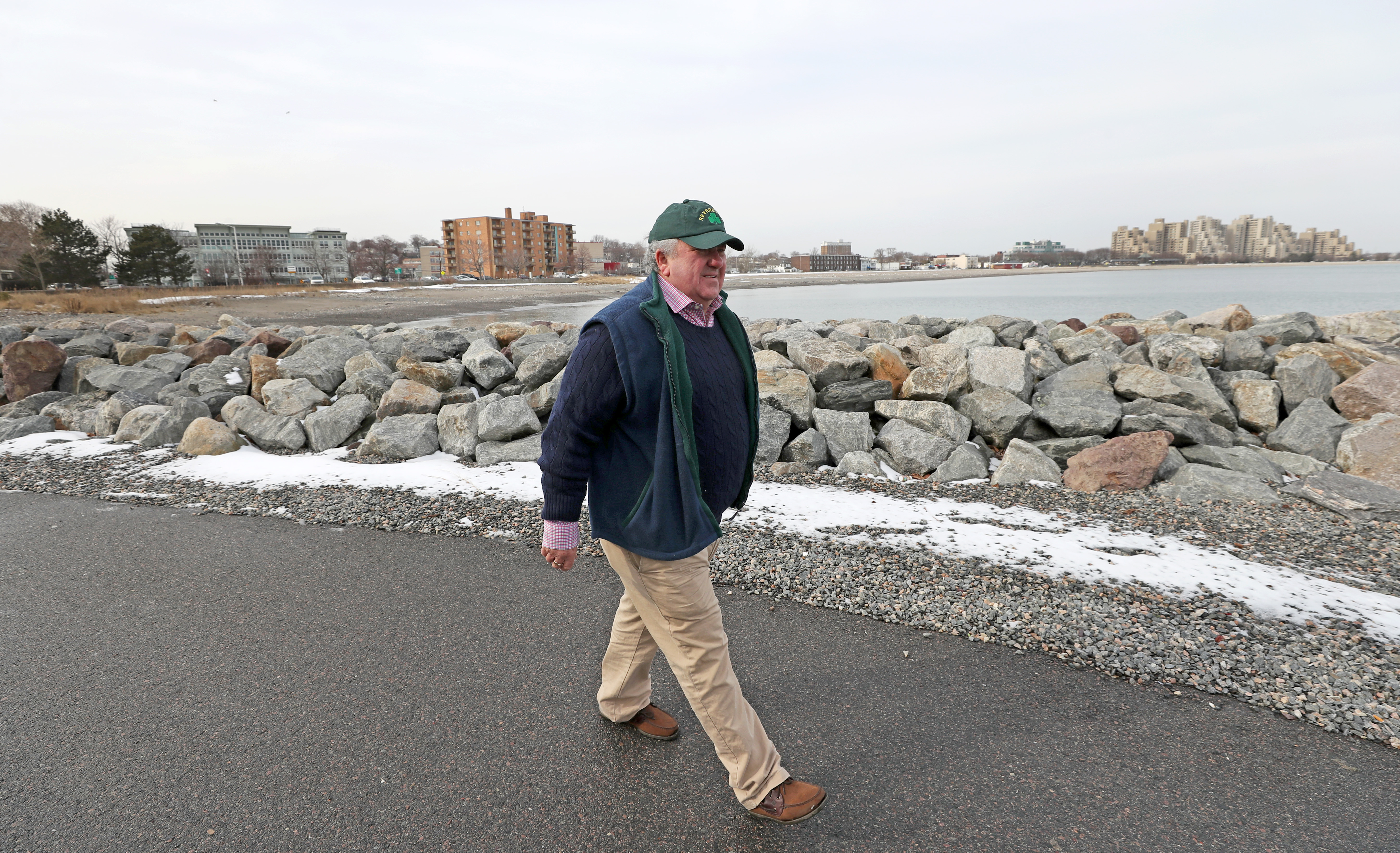 Retired fire chief Gene Doherty walked by a jetty near Winthrop Parkway.