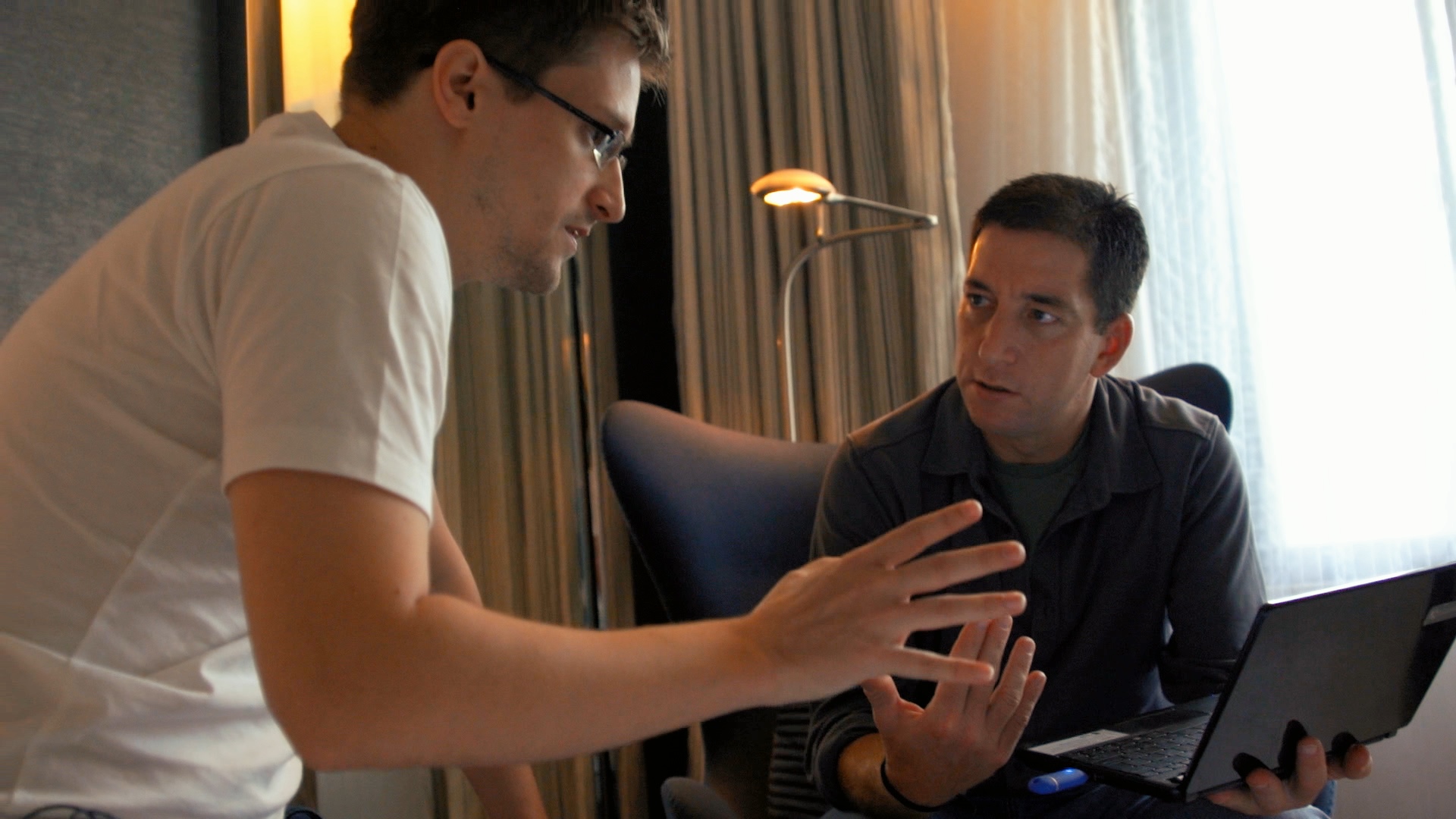 In “Citizenfour,” Edward Snowden (left) spoke with reporter Glenn Greenwald in a Hong Kong hotel room.