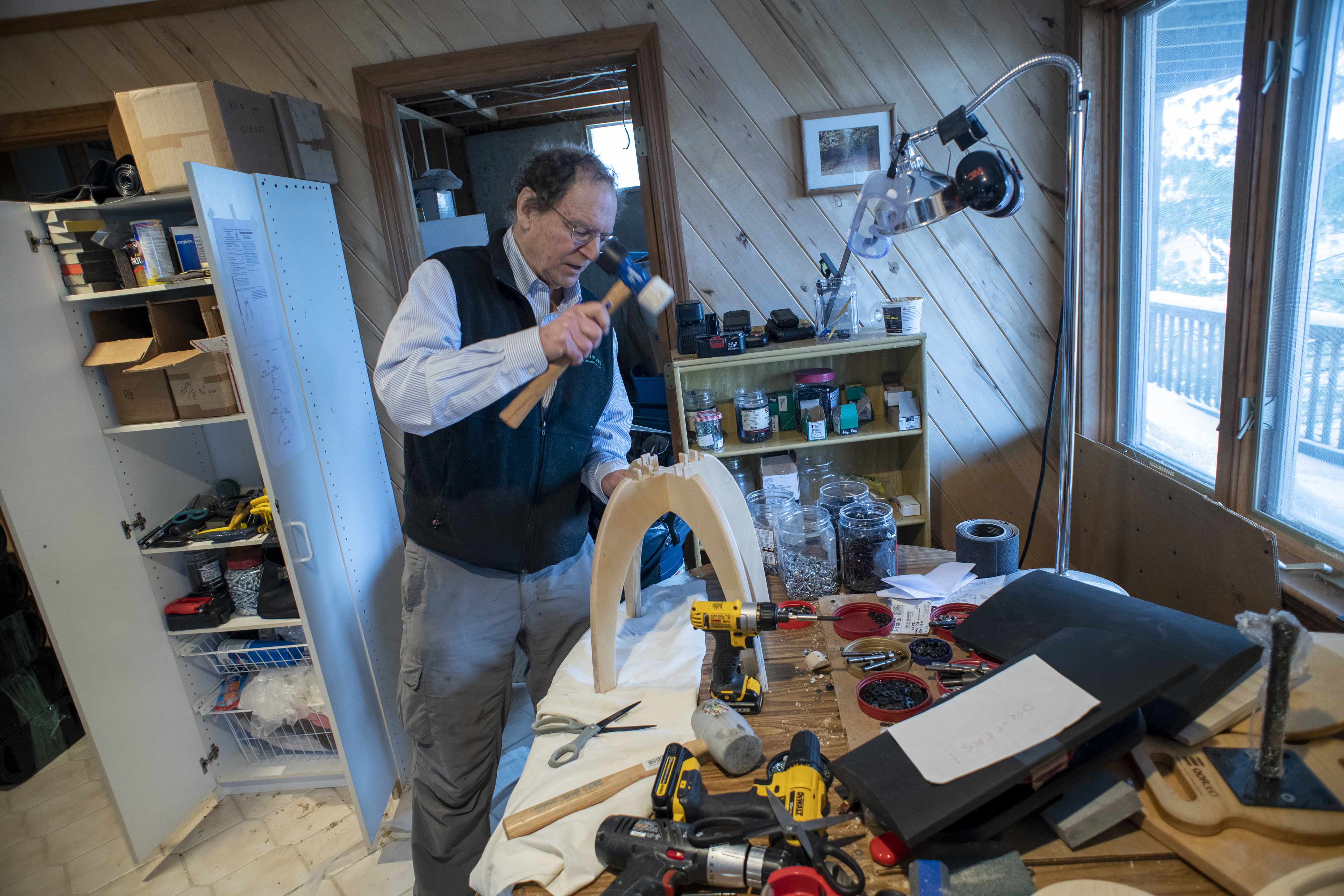 Dr. Turner Osler worked on one of his active chairs.
