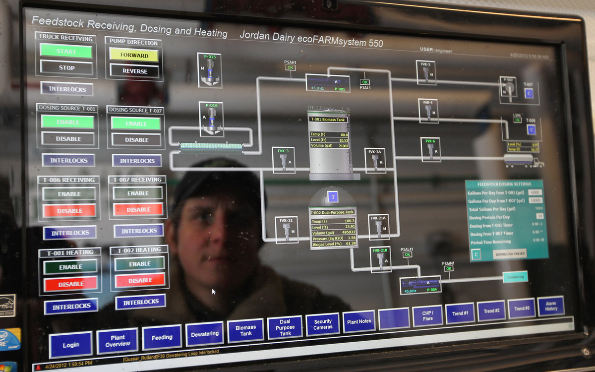 Shannon Carroll of Casella Waste Systems monitored the anaerobic digestive plant at the Jordan Dairy Farm in Rutland. Since the plant began operating last year, it processes about 45 tons a day of food waste. As the state prepares to issue new rules this summer, some business groups have raised questions about the potential costs.