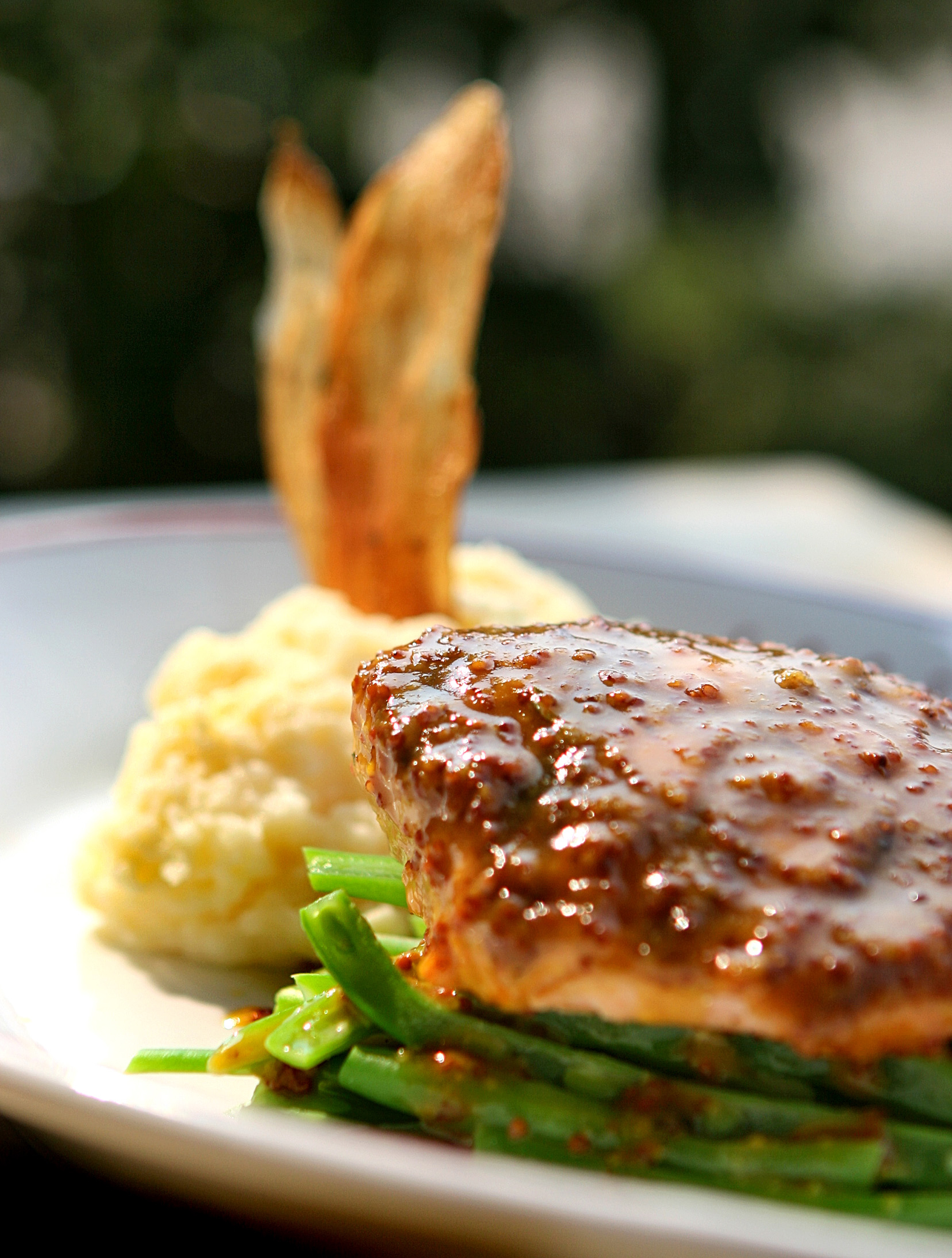 Roasted salmon with mustard glaze, potatoes, and beans at Eastern Standard.