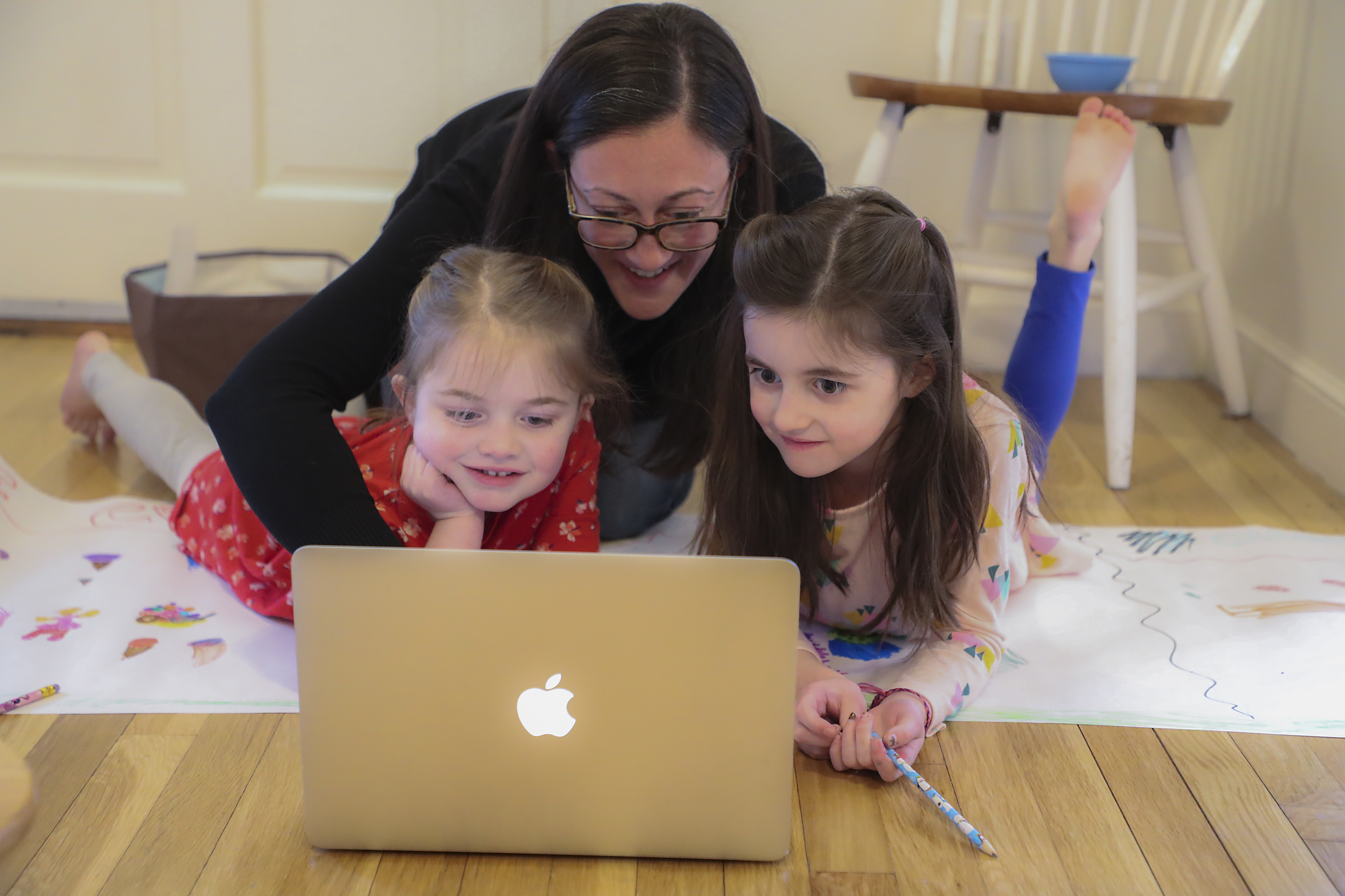 Sarah Yunits and her daughters Ada, 7, and Cora, 5, FaceTimed their cousins in Chicago.