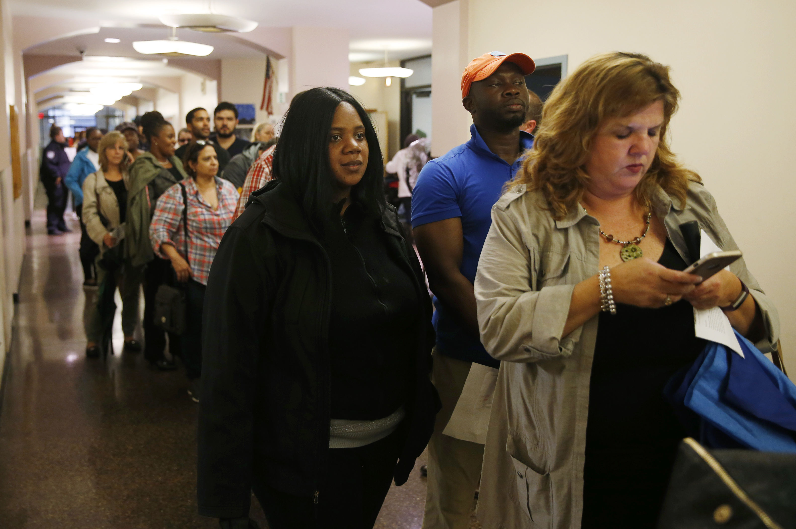 People waited in line for an Income Restricted Housing Lottery at The Beverly on Court Street.