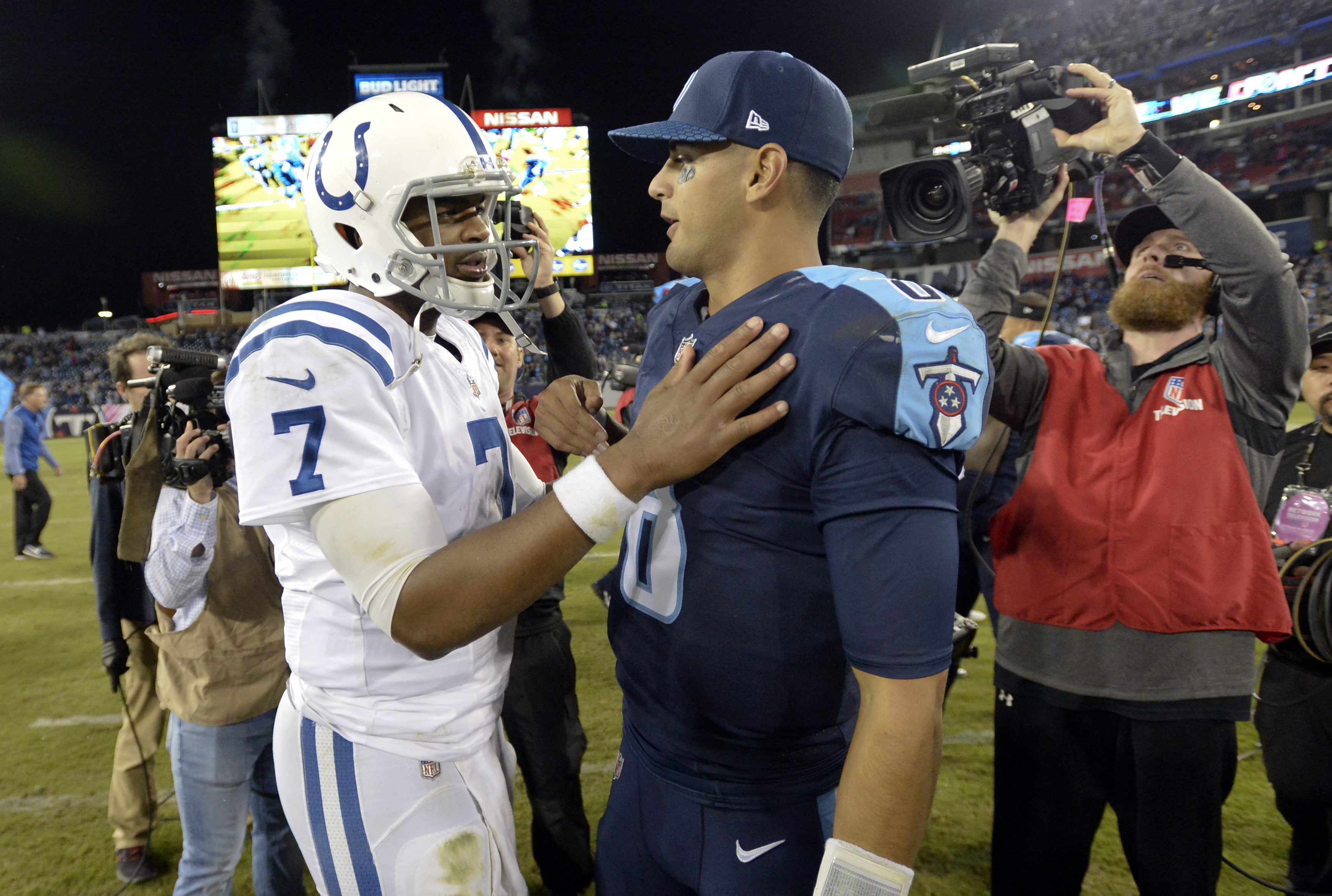 Jacoby Brissett (left and the Colts lost to Marcus Mariota and the Titans on Monday night.