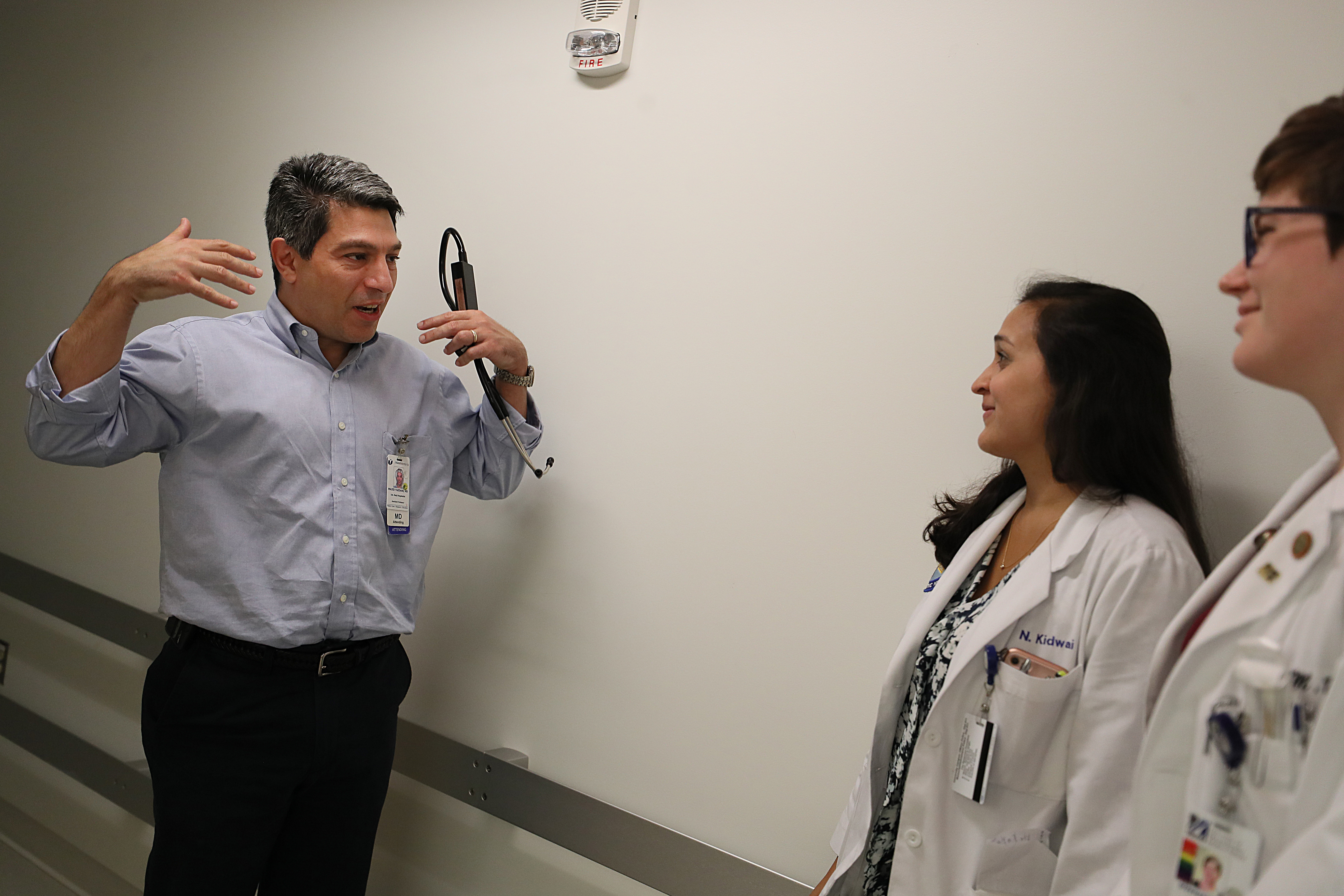 Dr. Majid Yazdani instructed UMass Medical School students Neiha Kidwai and Stephanie Bond.