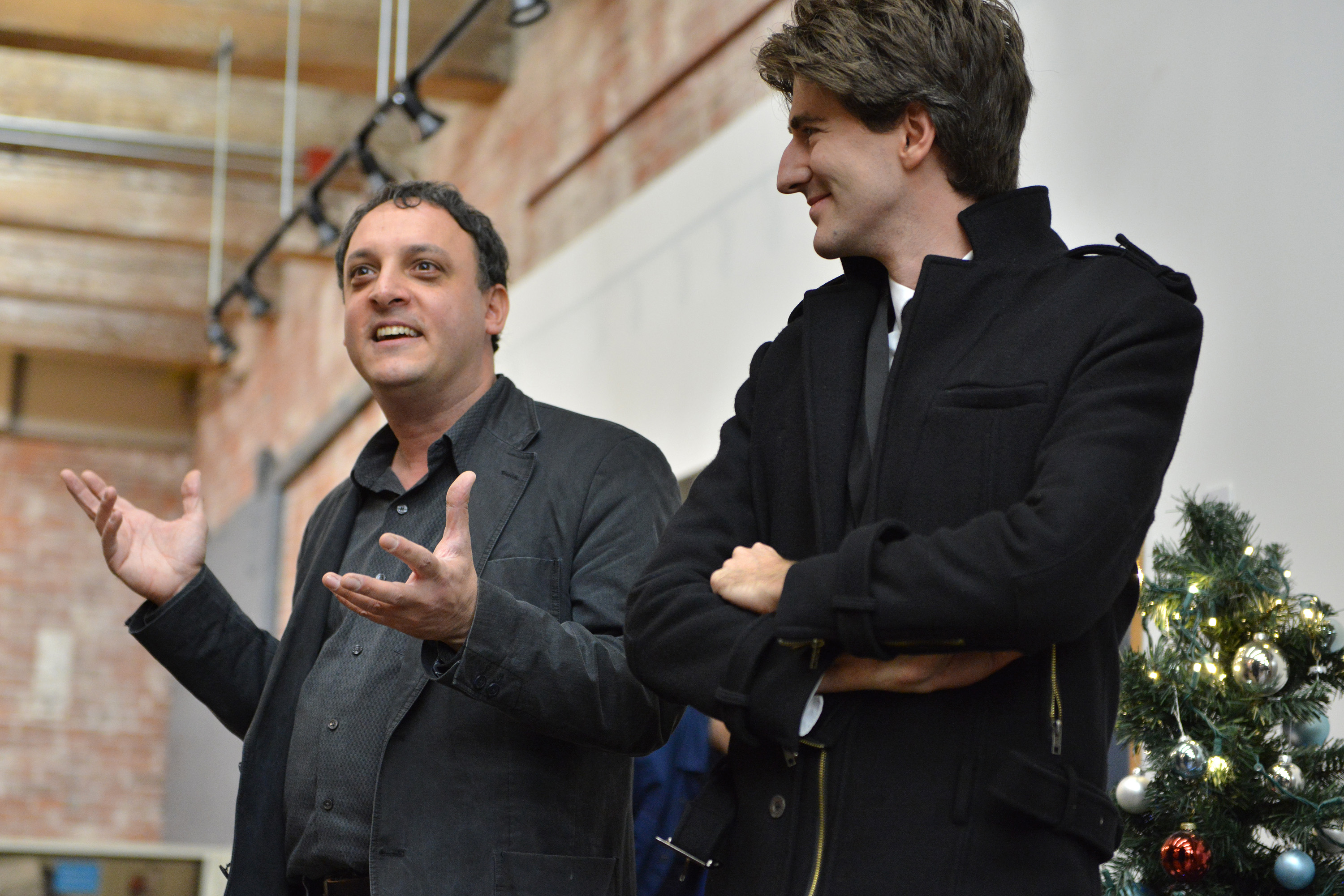 “What begins now is a period of fund-raising that is very, very crucial,” said Raber Umphenour (right), shown with fellow residents board official Nick Ortolino at their meeting with Midway Studio artists this week.