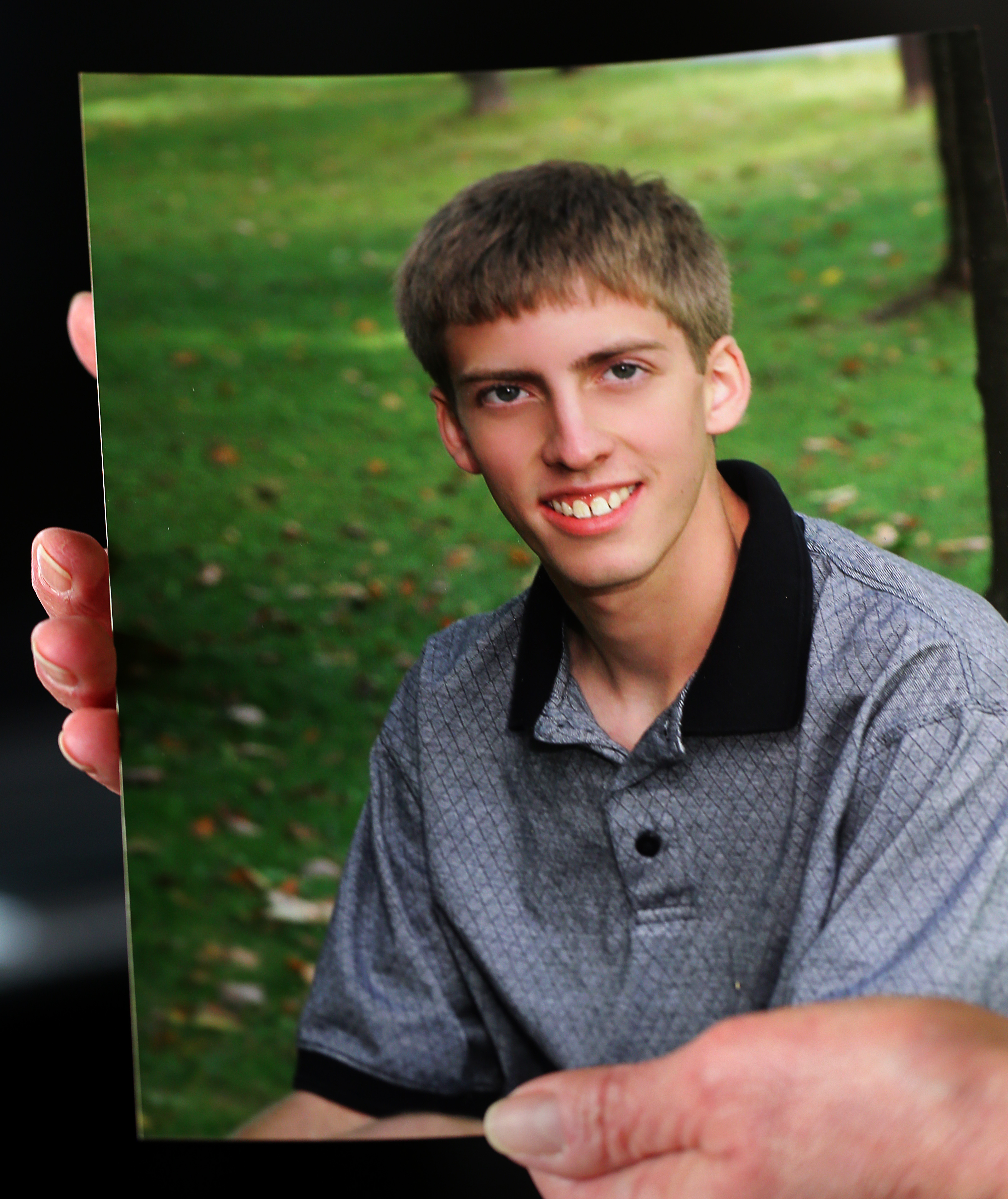 Gwen Phelps held a photograph of her son Jacob, who died of a suspected heroin overdose. More than 1,000 people died from opioid overdoses in Massachusetts in 2014.