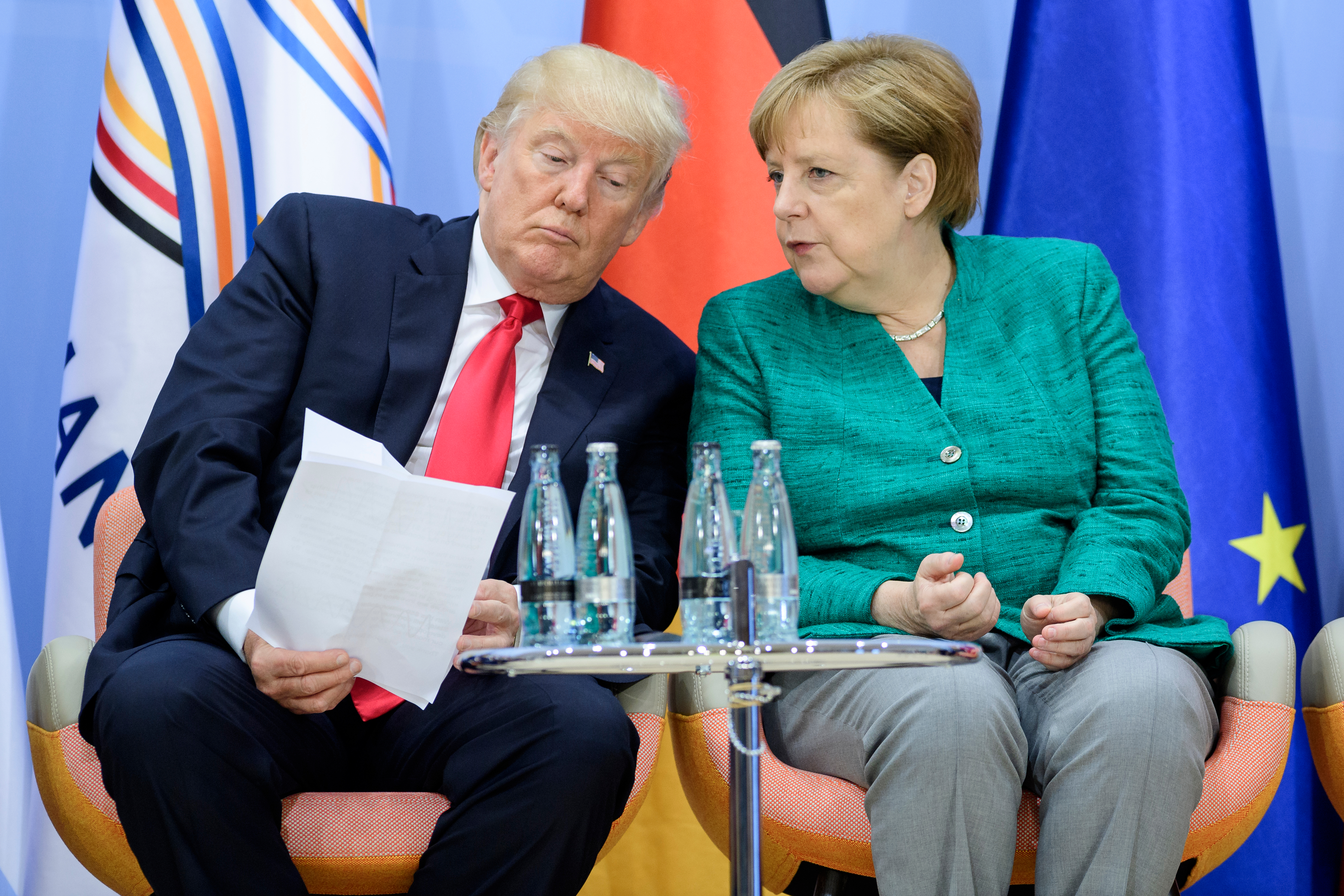 Trump and German Chancellor Angela Merkel attended a panel discussion Saturday at the G-20 summit.
