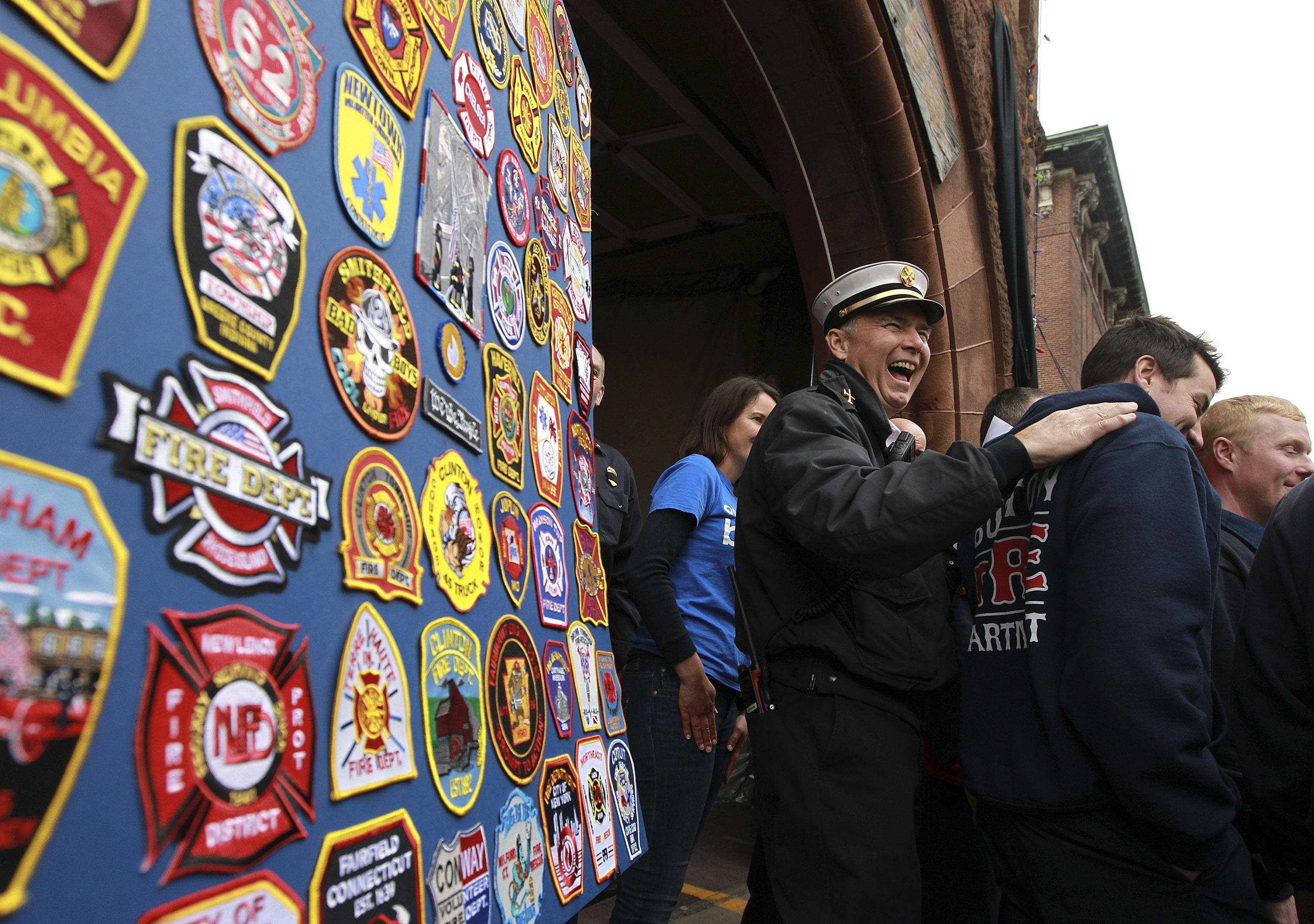 Members of the One Run for Boston, a nation-wide relay race which ran from Calif. to Mass. picking up patches from firehouses along the way, delivered them to the Boylston Street Firehouse in memory of their fallen comrades.