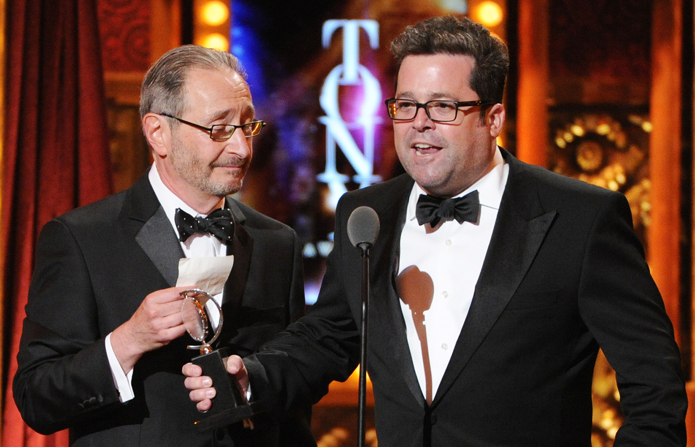 Huntington Theatre Company managing director Michael Maso (left) and artistic director Peter DuBois accepted the regional theater award.