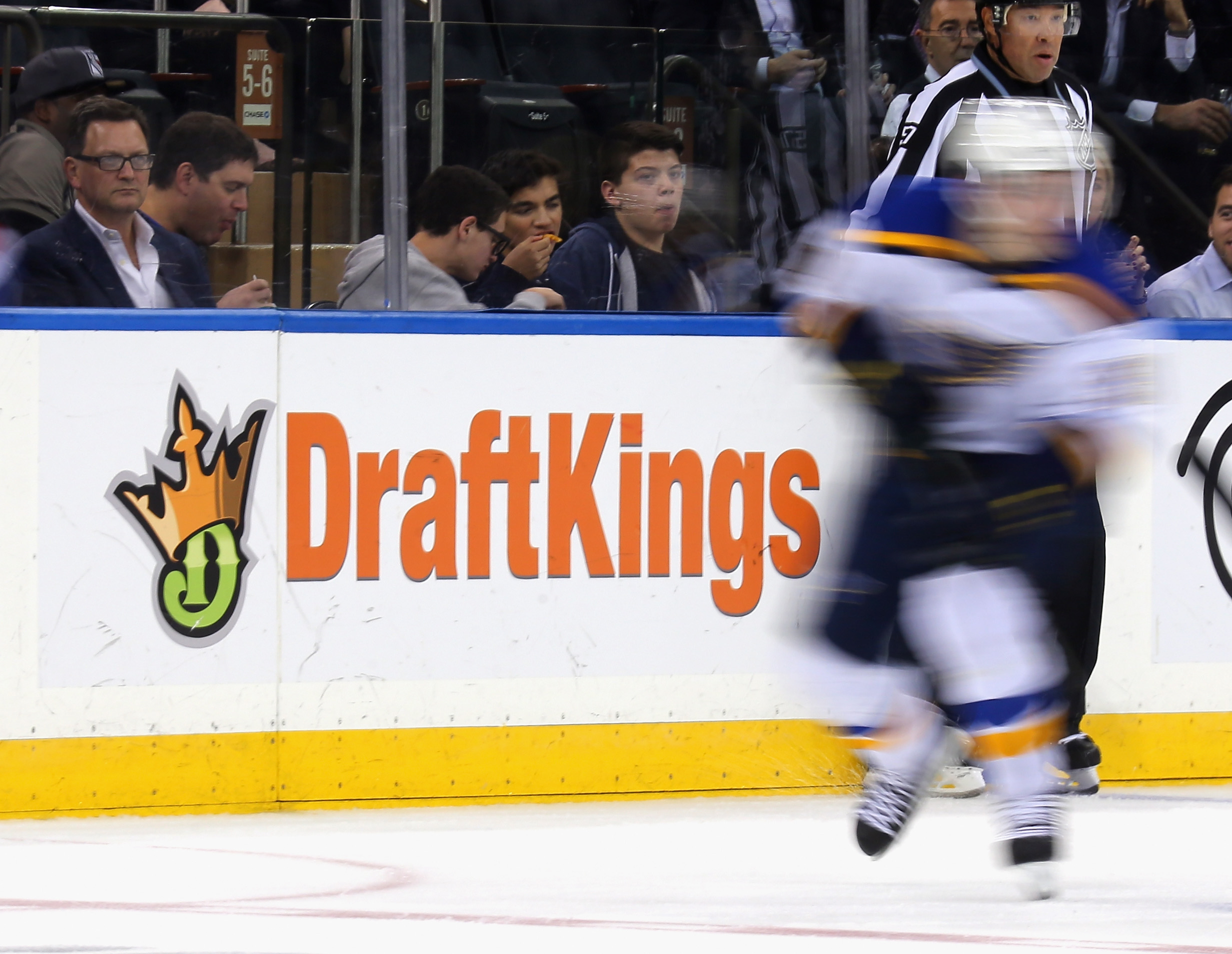 The New York Rangers and St. Louis Blues skated in front of board advertising forthe betting website DraftKings at Madison Square Garden on Thursday.