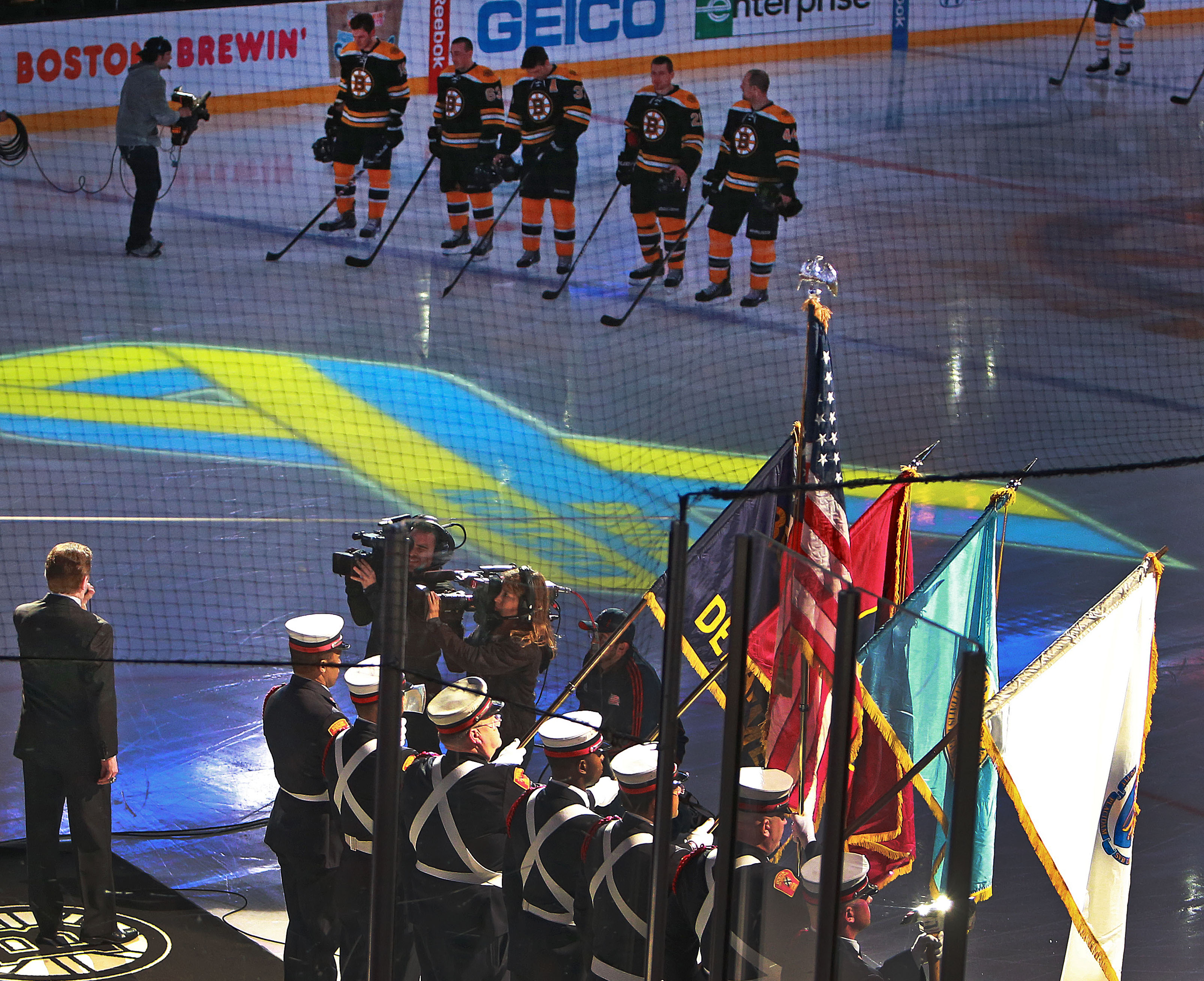 The Boston Fire Department took the Garden ice with Rene Rancourt for a poignant national anthem.