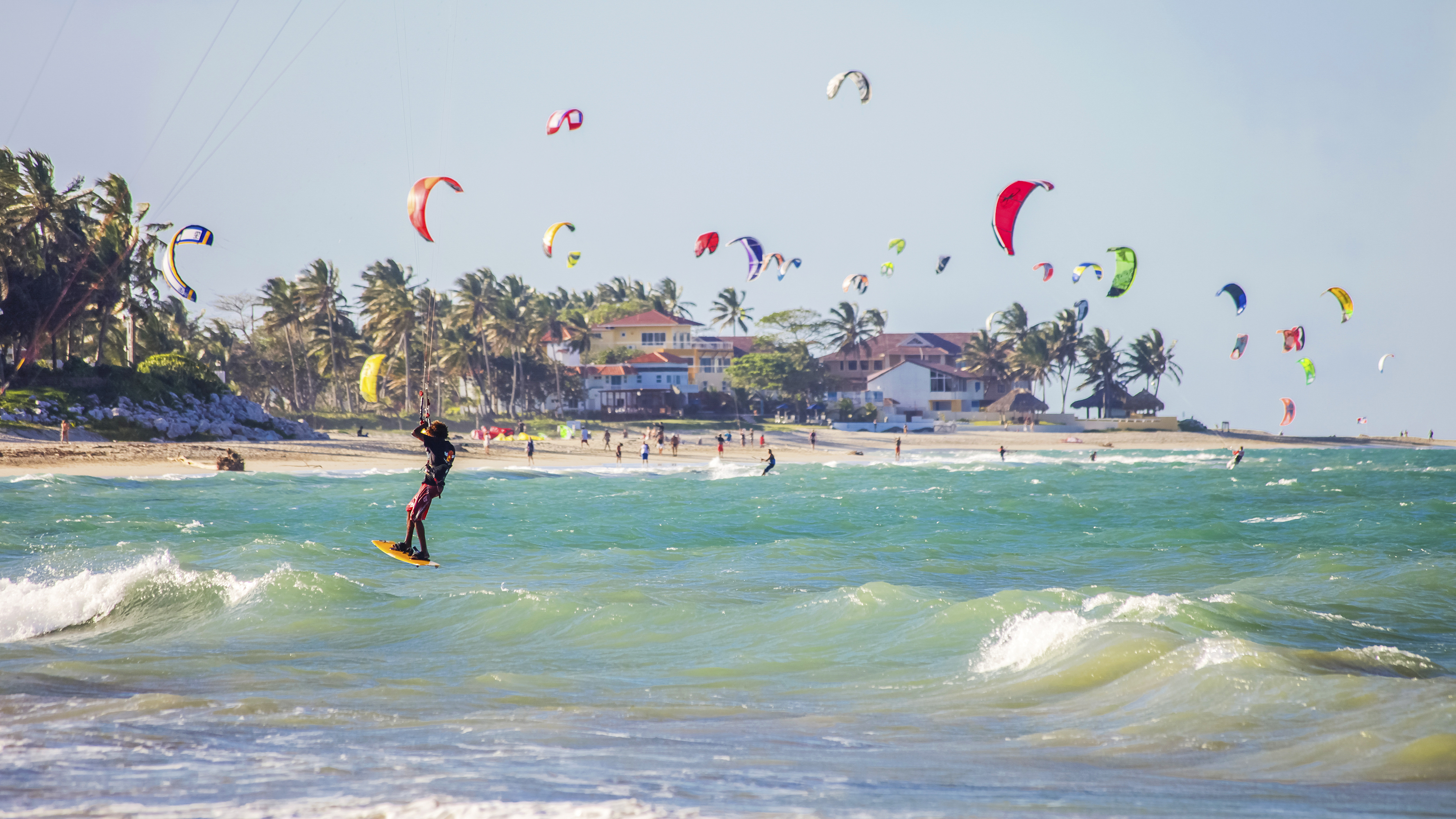 Kiteboarders take advantage of a strong wind in Cabarete.