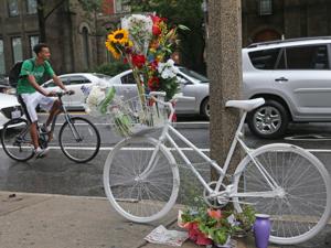 A ghost bike left earlier this year at the corner of Massachusetts Avenue and Beacon Street where cyclist Anita Kurmann, 38, was killed in a collision with a tractor-trailer.