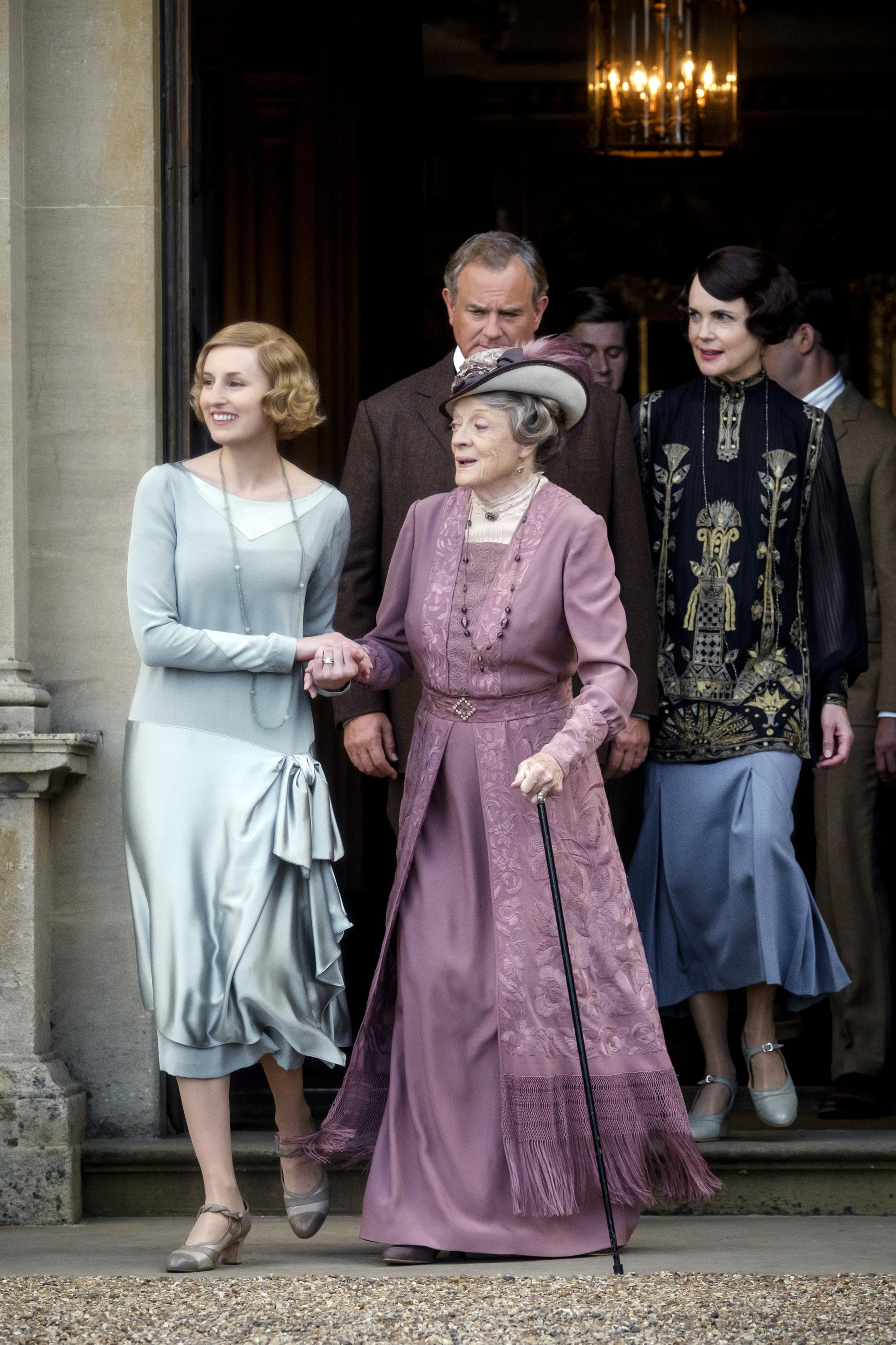 This image released by Focus features shows, from left, Laura Carmichael as Lady Hexham, Maggie Smith as The Dowager Countess of Grantham, Hugh Bonneville as Lord Grantham, Allen Leech as Tom Branson, and Elizabeth McGovern as Lady Grantham in a scene from "Downton Abbey."