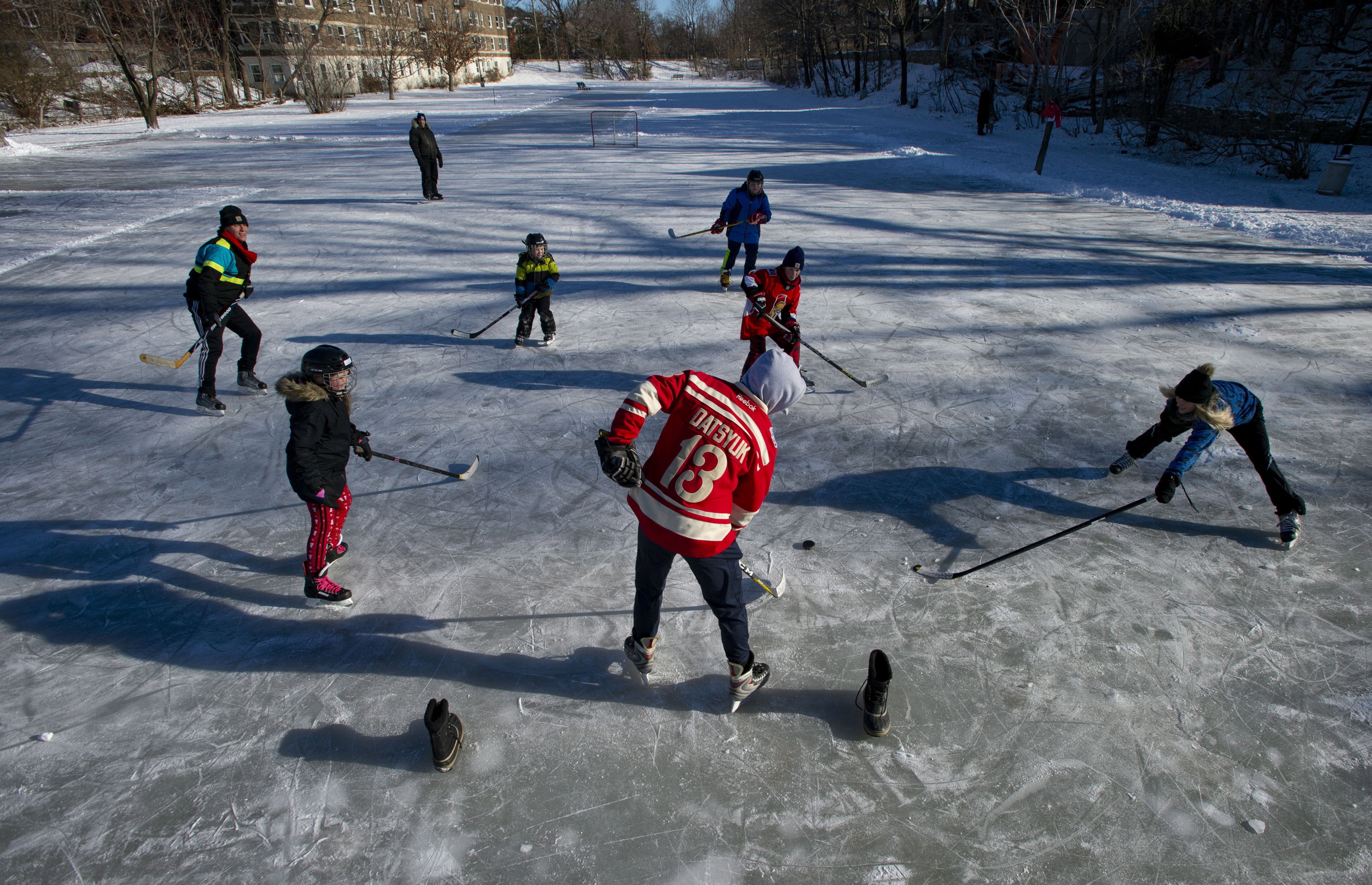 One day, this scene could be only a memory for Canadians and New Englanders: People playing hockey in Ottawa's Central Park, on Christmas Day, 2018.