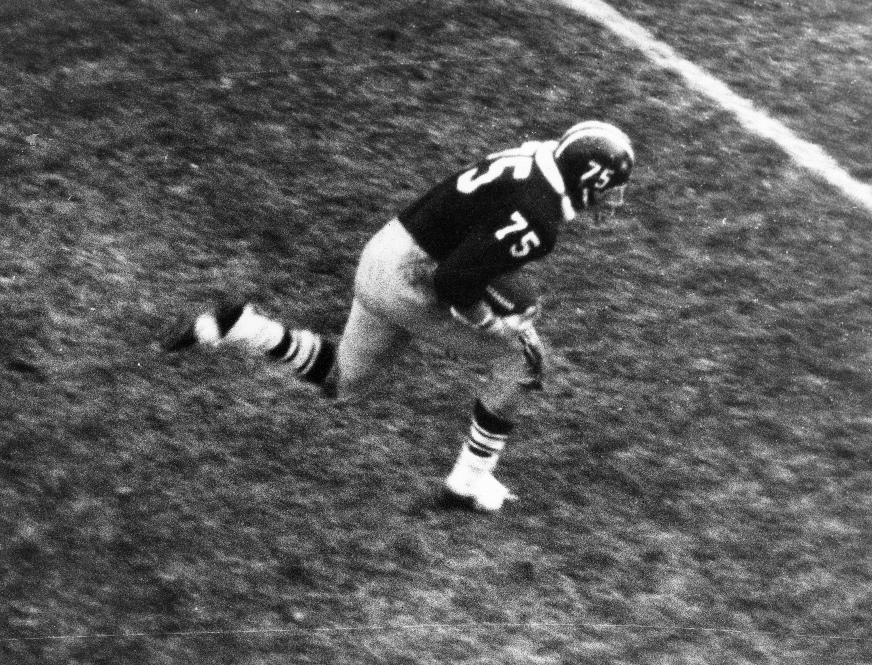 Harvard‘s Fritz Reed stumbles to Yale's 15 yard line after picking up a fumbled lateral.
