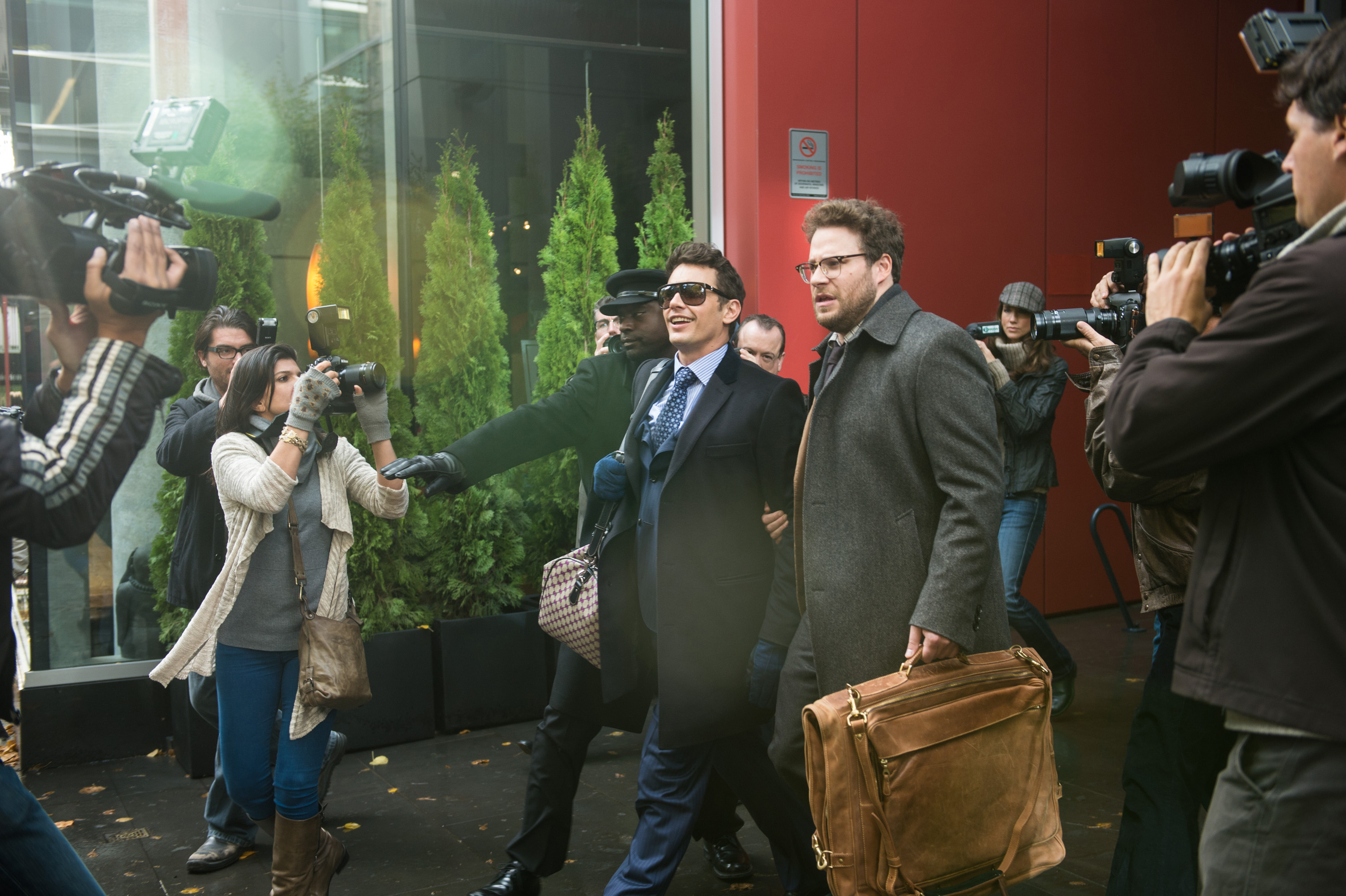 James Franco (center, left) as Dave, and Seth Rogen (center, right) as Aaron in Columbia Pictures' "The Interview."