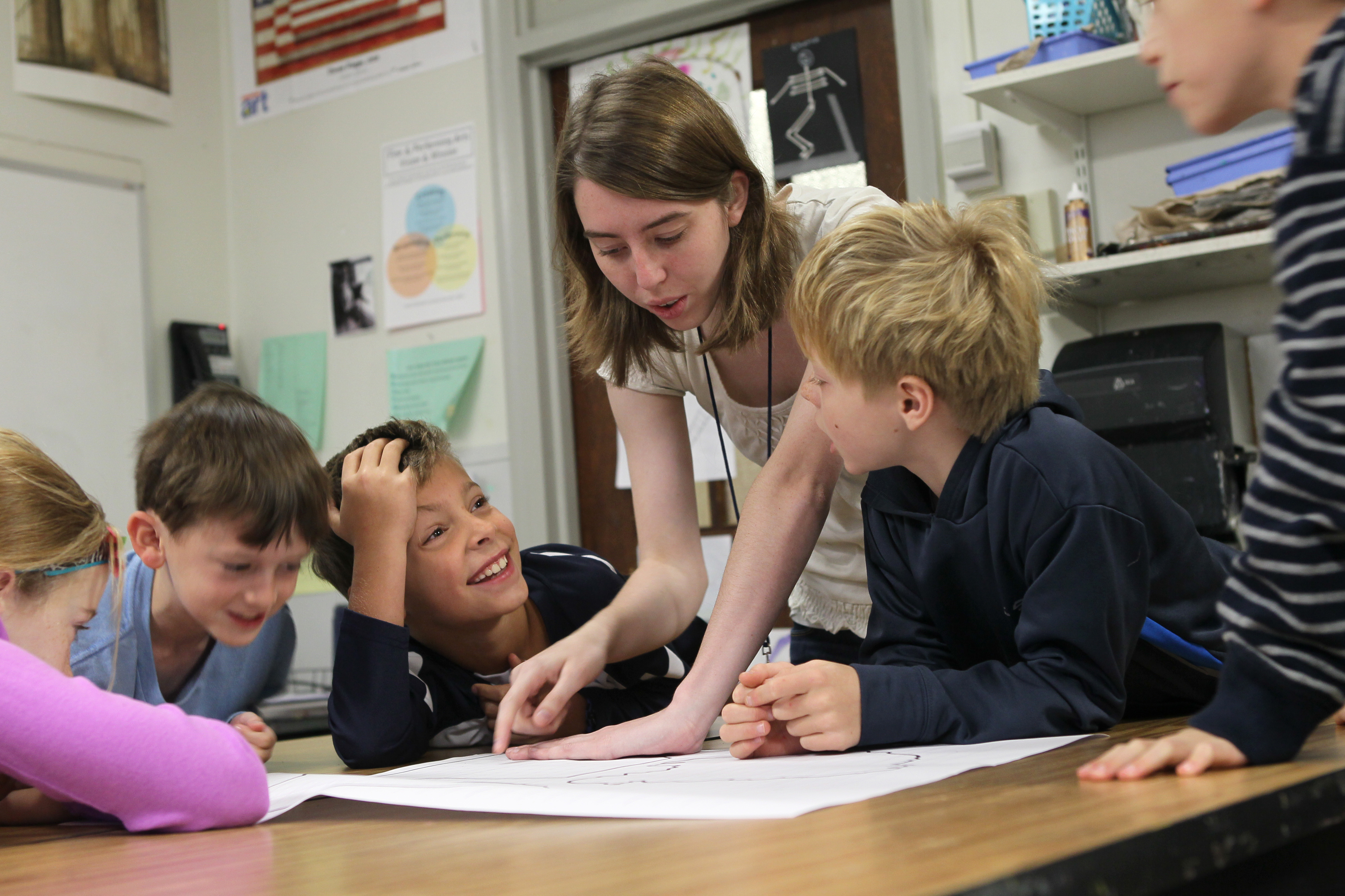 Olin student Chelsea Nayback works with 3rd graders at the Mitchell School in Needham to try and get them excited about science and engineering.