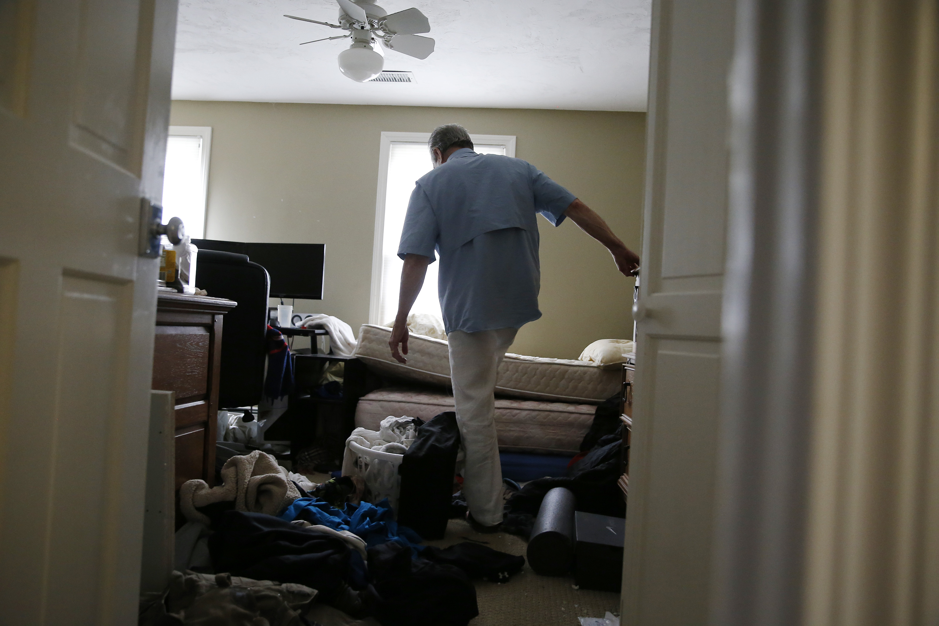 Russell Reeves walked through a second bedroom that was used by his son.