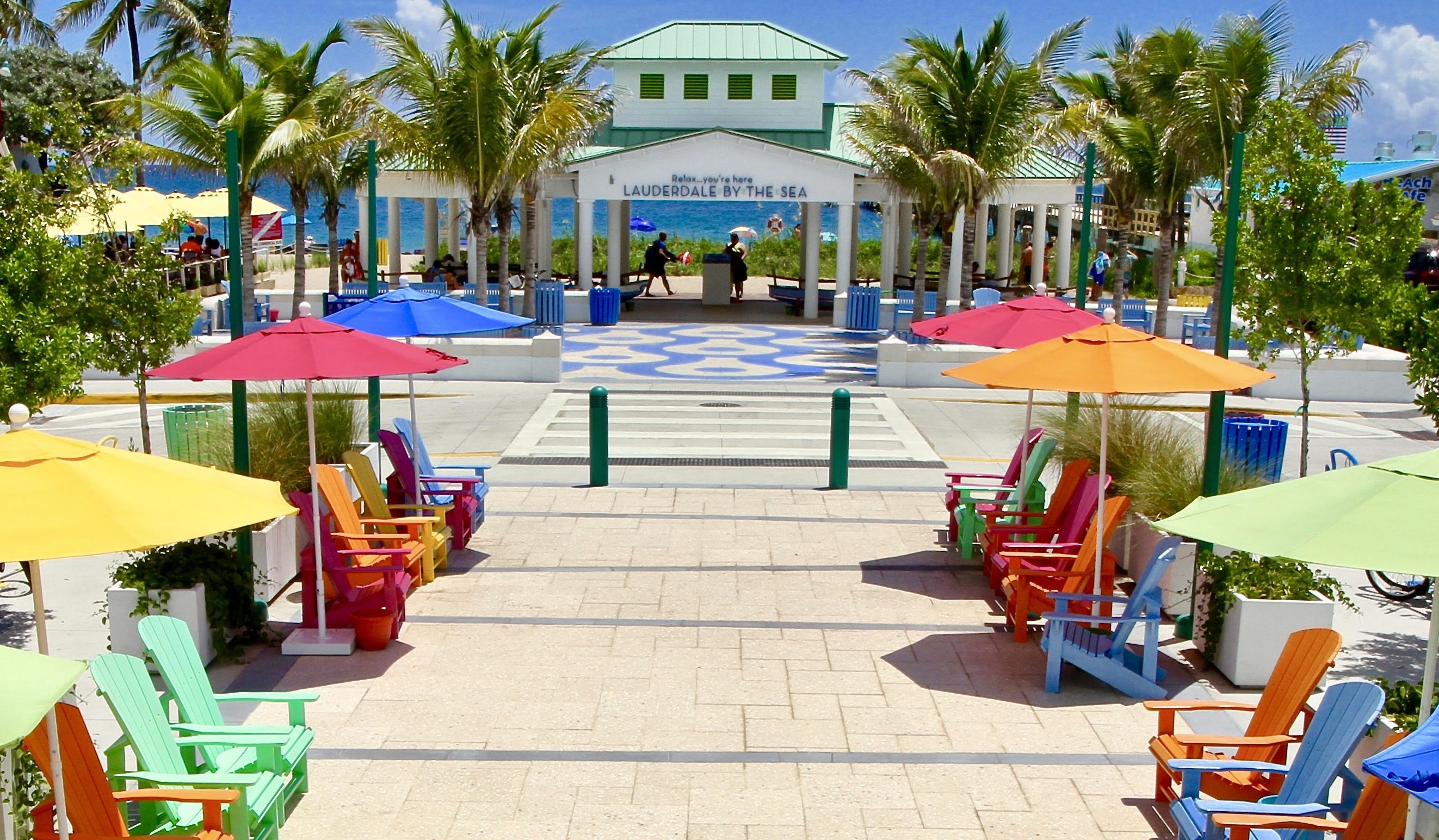Adirondack chairs flank the park leading to the beach in Lauderdale-by-the-Sea.