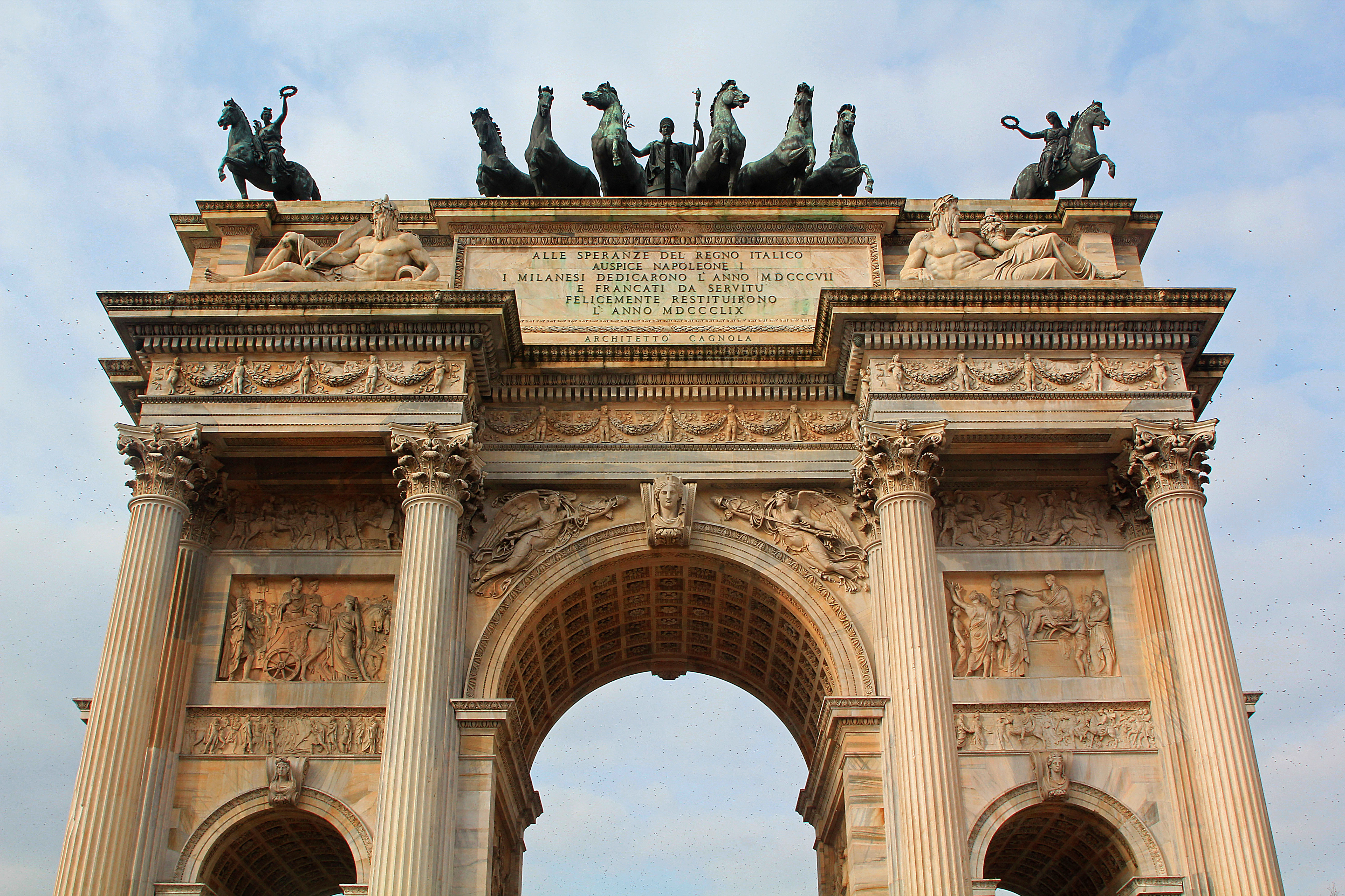 The Arco della Pace was initially commissioned by Napoleon as a tribute to his feats in battle. After he was deposed as emperor, the memorial was redesigned to feature a bas-relief of his defeat in battle and statues turned to face away from Paris.