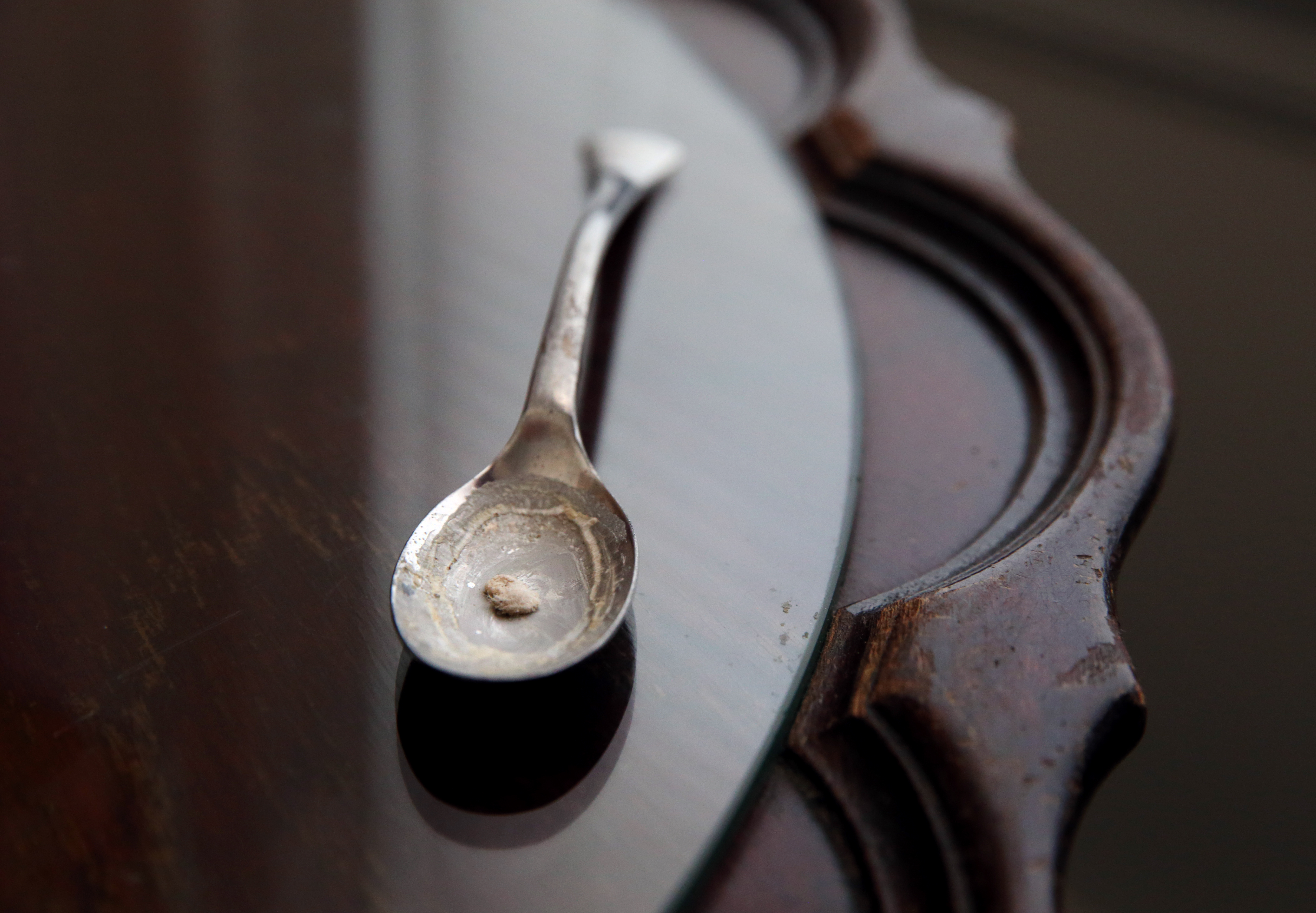 After firing Sarah Estrella, Deborah Lesco found signs of drug use in her home, including a flame-blackened and bent spoon with residue that tested positive for heroin and fentanyl.